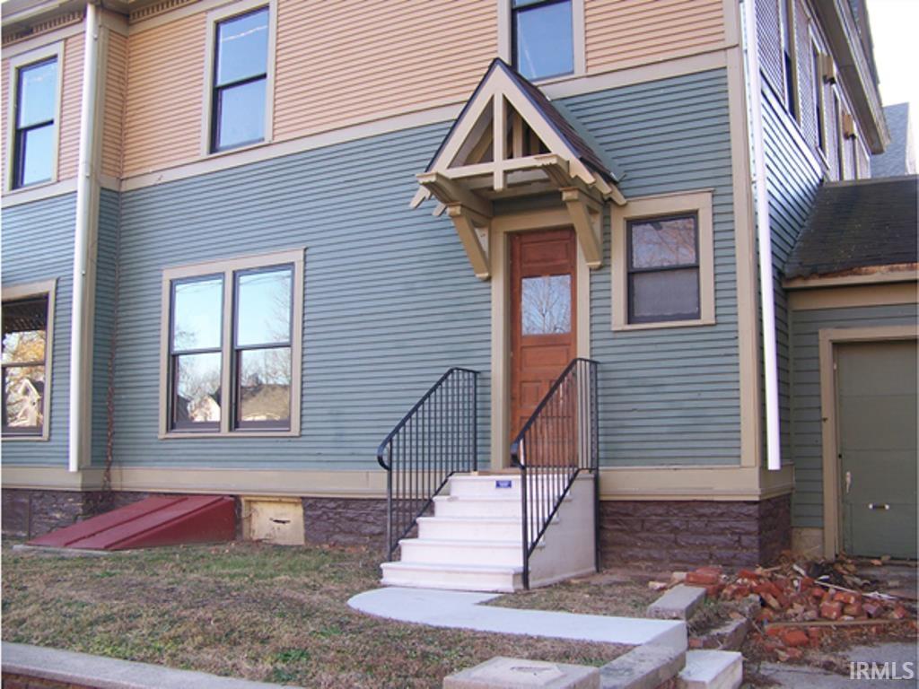View of front of property featuring an attached garage