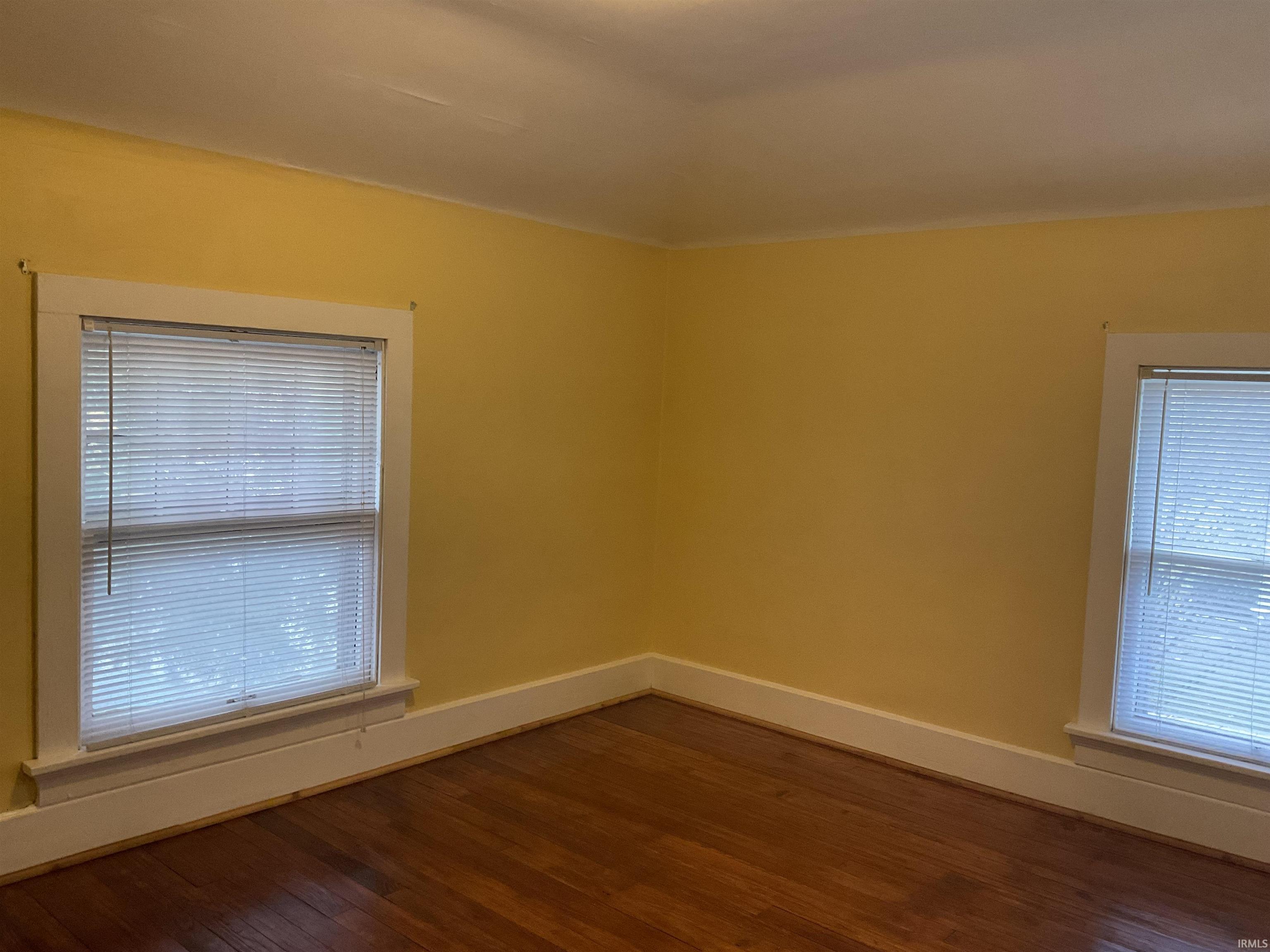 Bedroom with hardwood floors