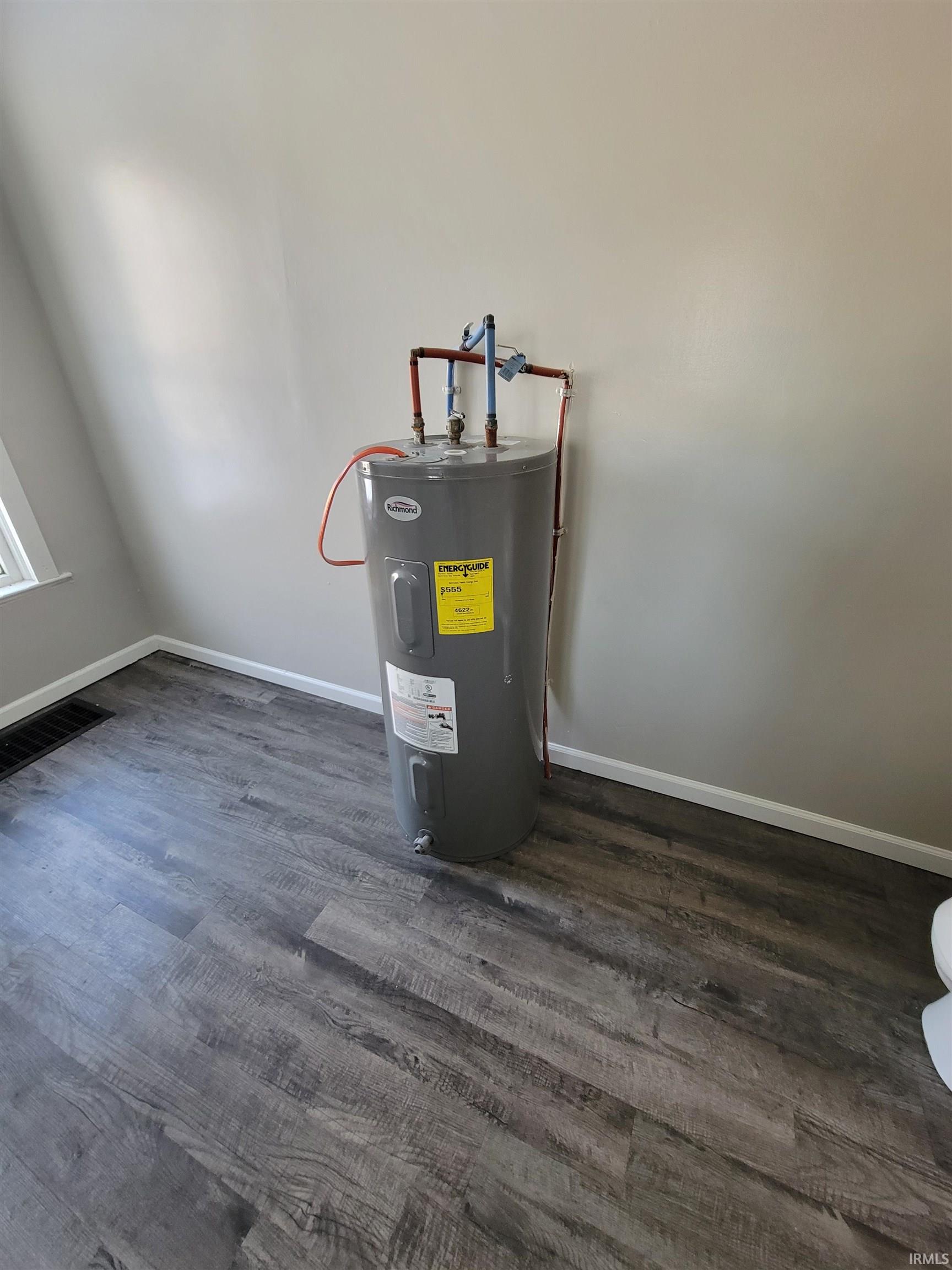 Utility room with electric water heater
