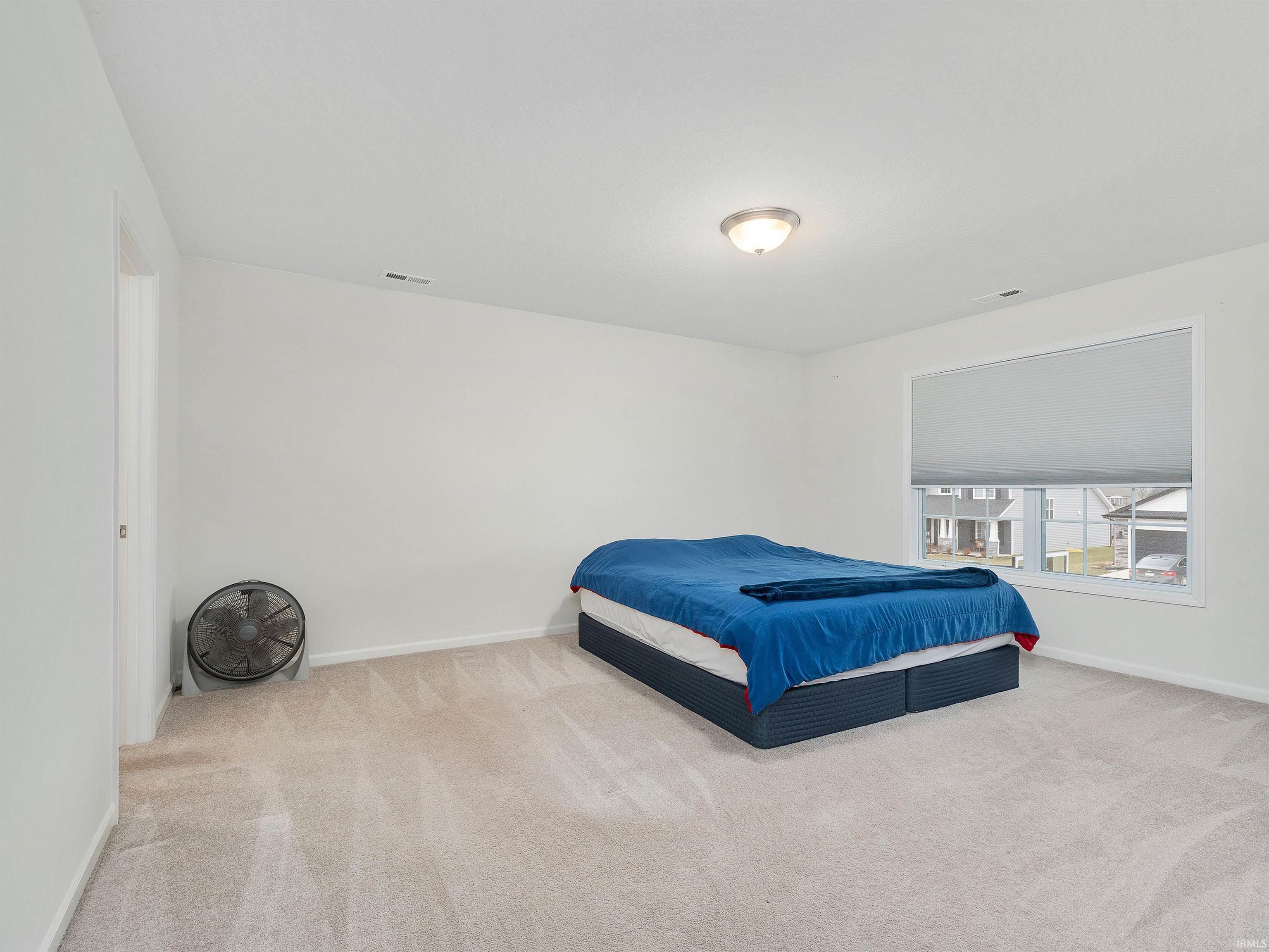 Bedroom featuring carpet