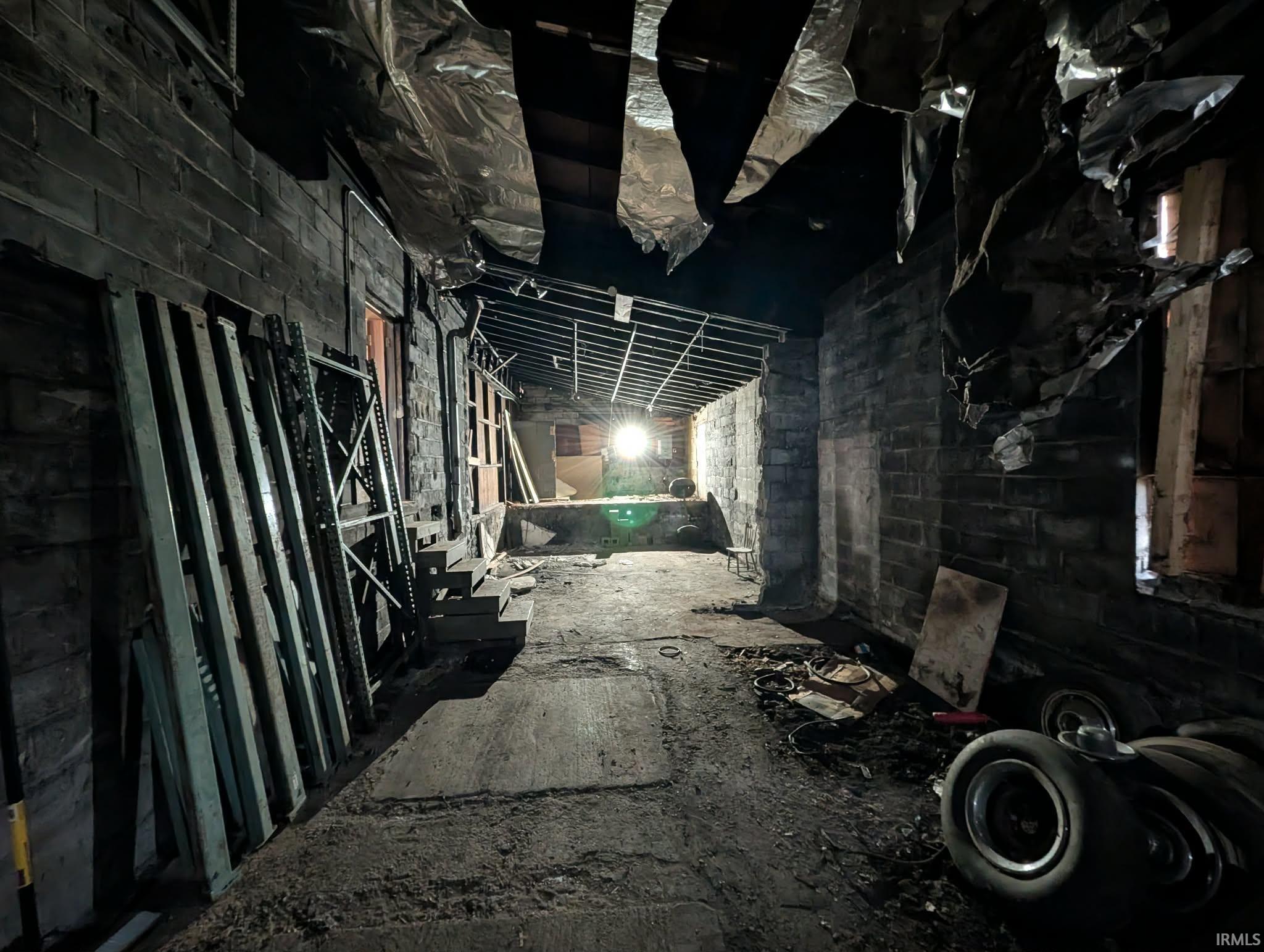 Miscellaneous room with concrete block wall