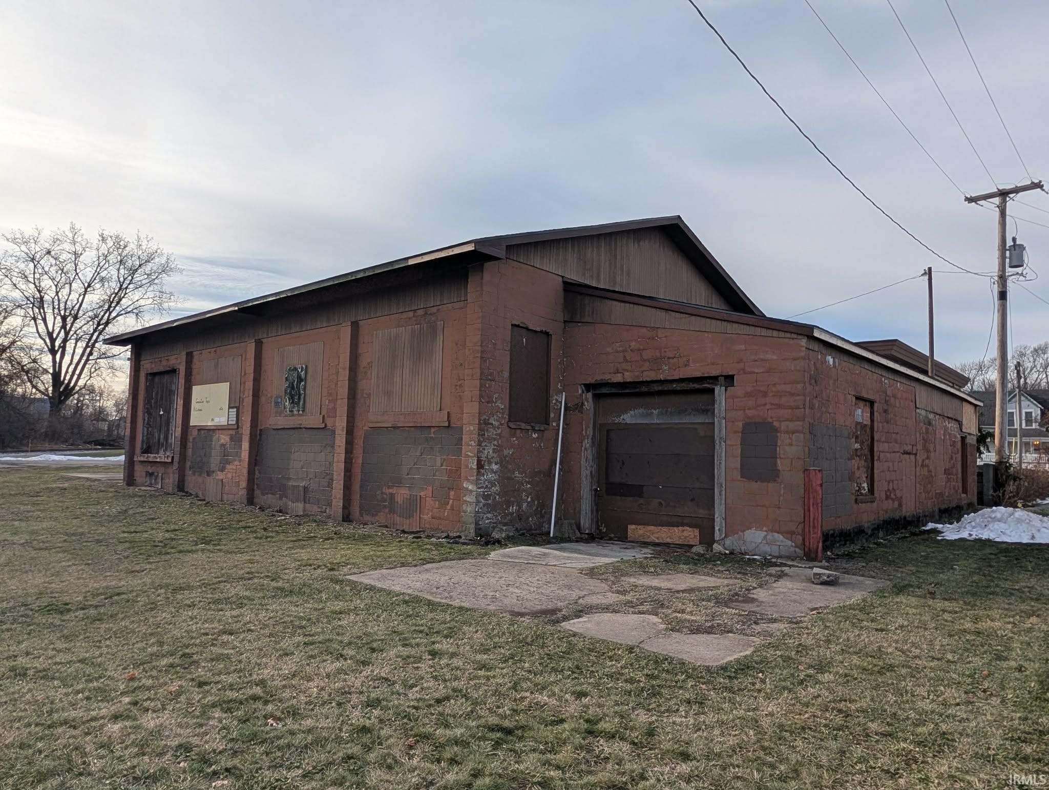 View of outdoor structure with a garage