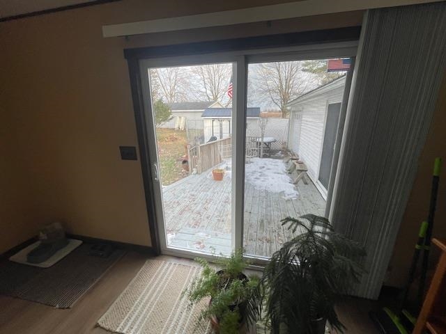 living room with patio door to deck