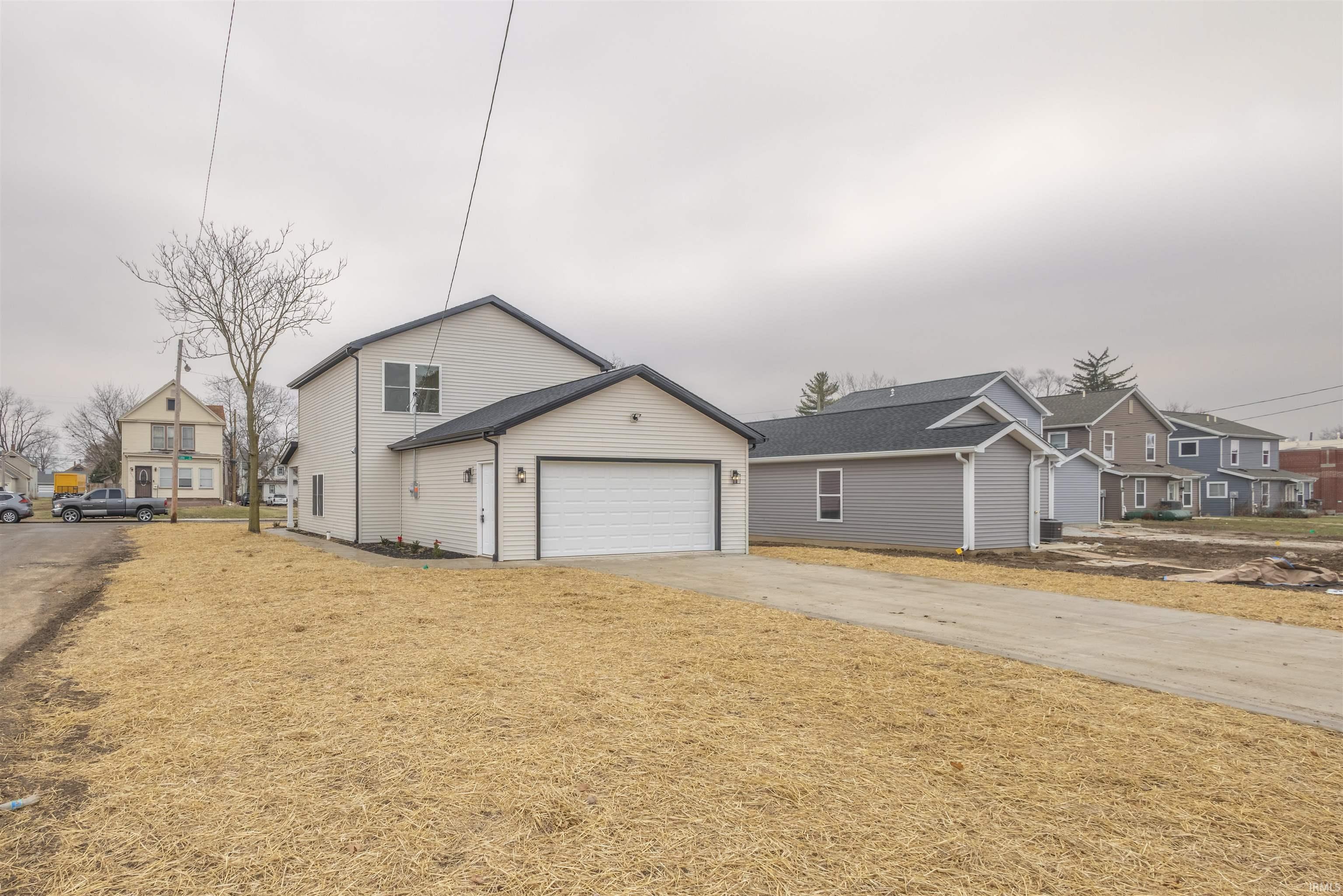 View of front of home featuring driveway