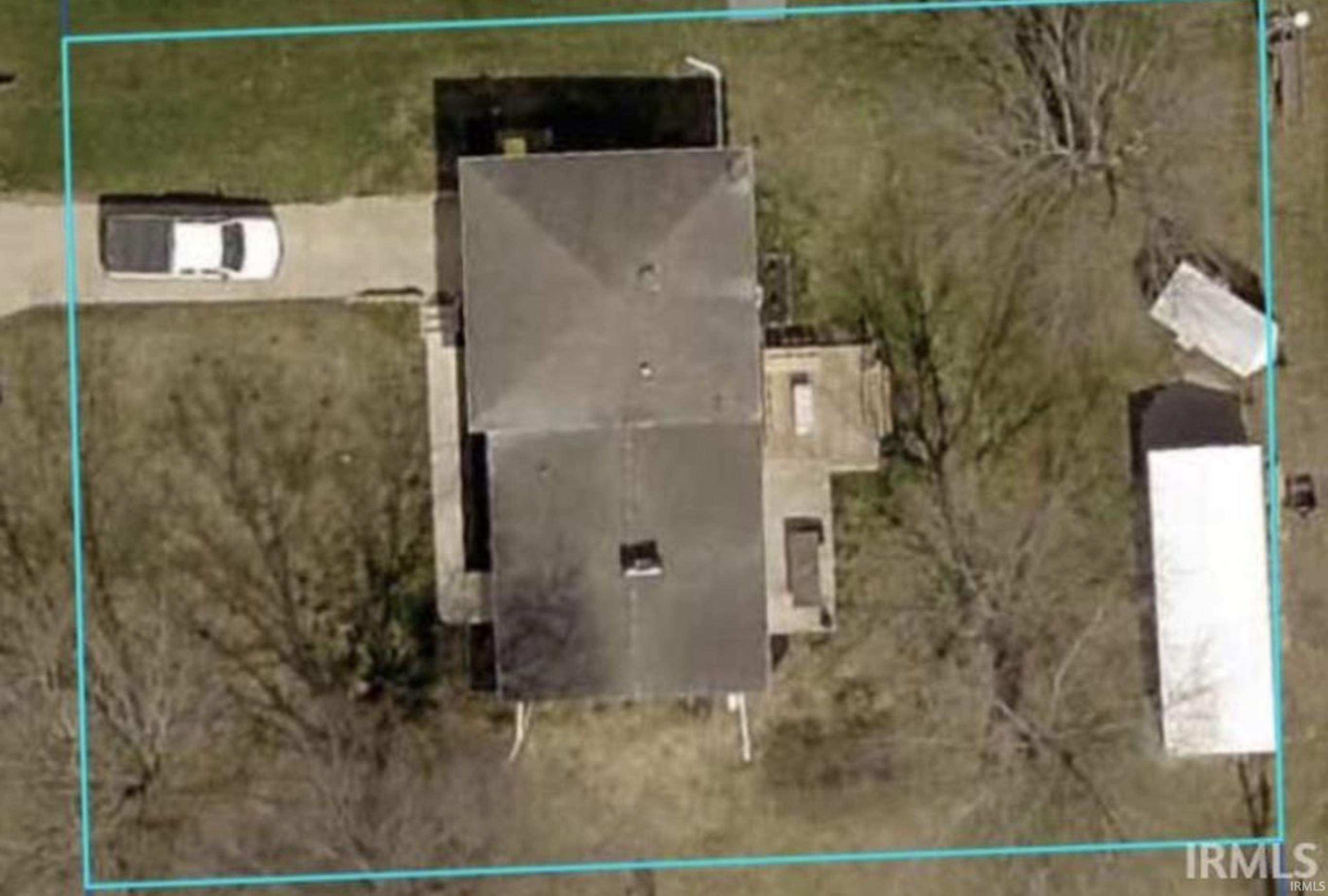 Aerial overview of property's location featuring property parcel outlined