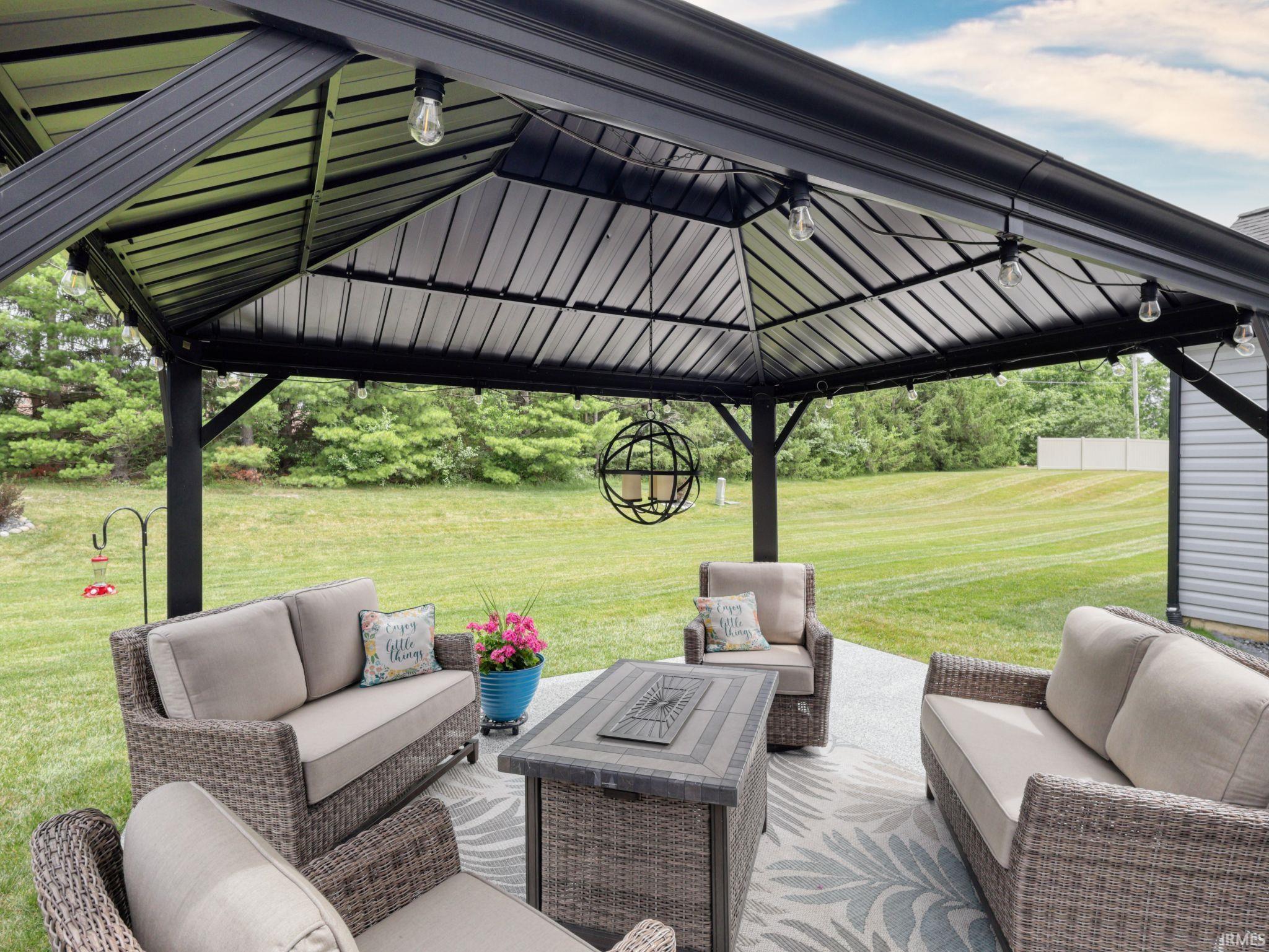View of patio / terrace with an outdoor living space and a gazebo