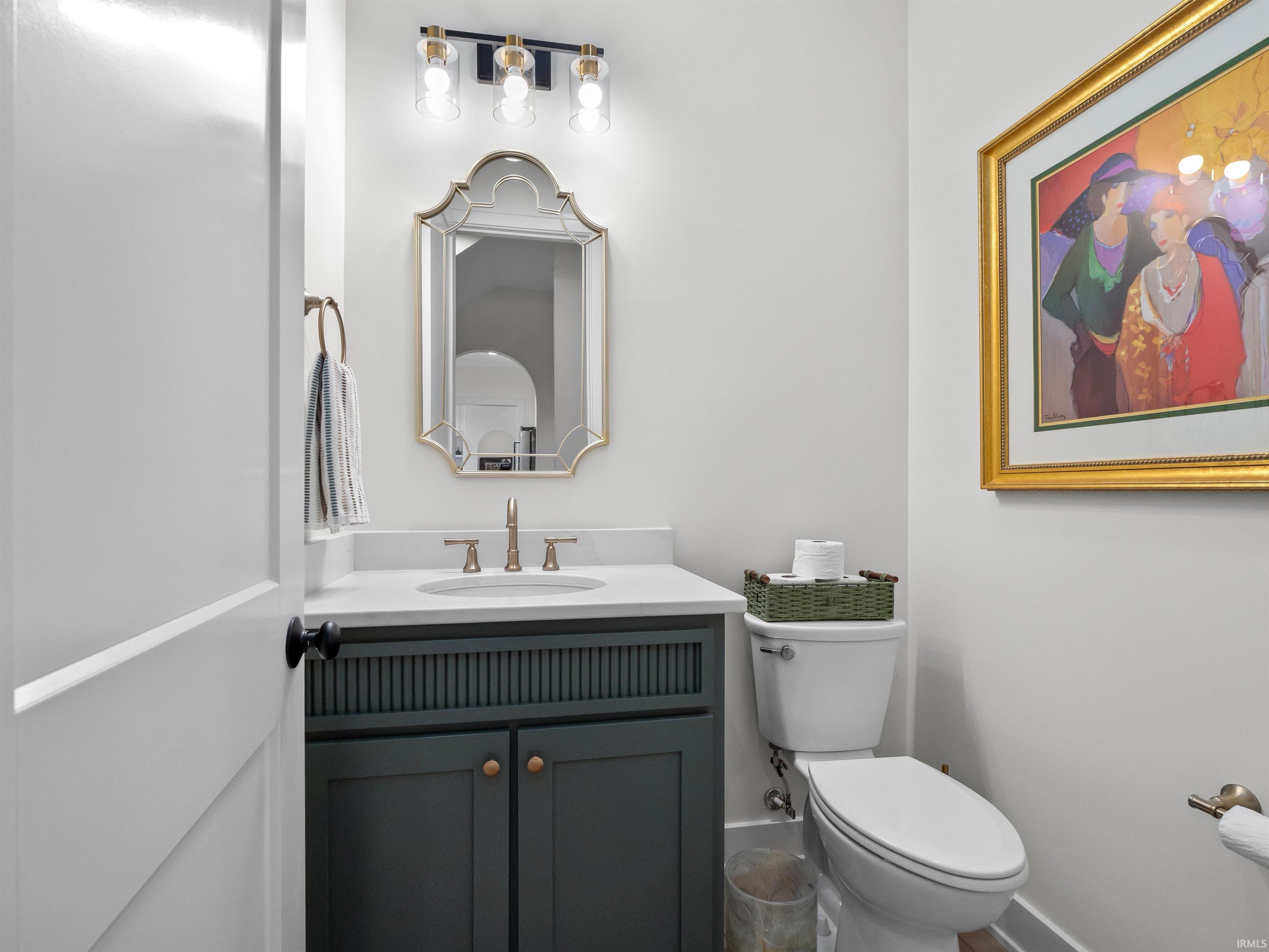 Bathroom with vanity and toilet