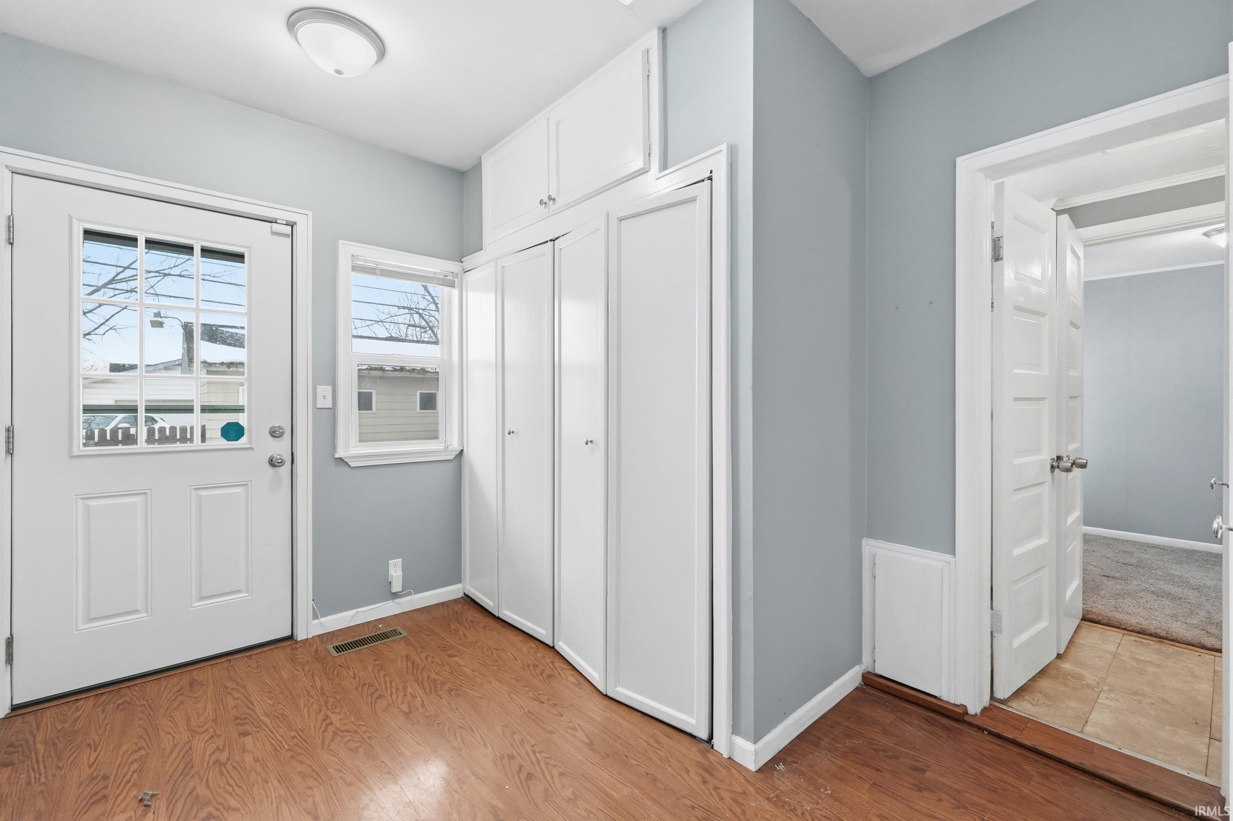 Entryway featuring light wood finished floors