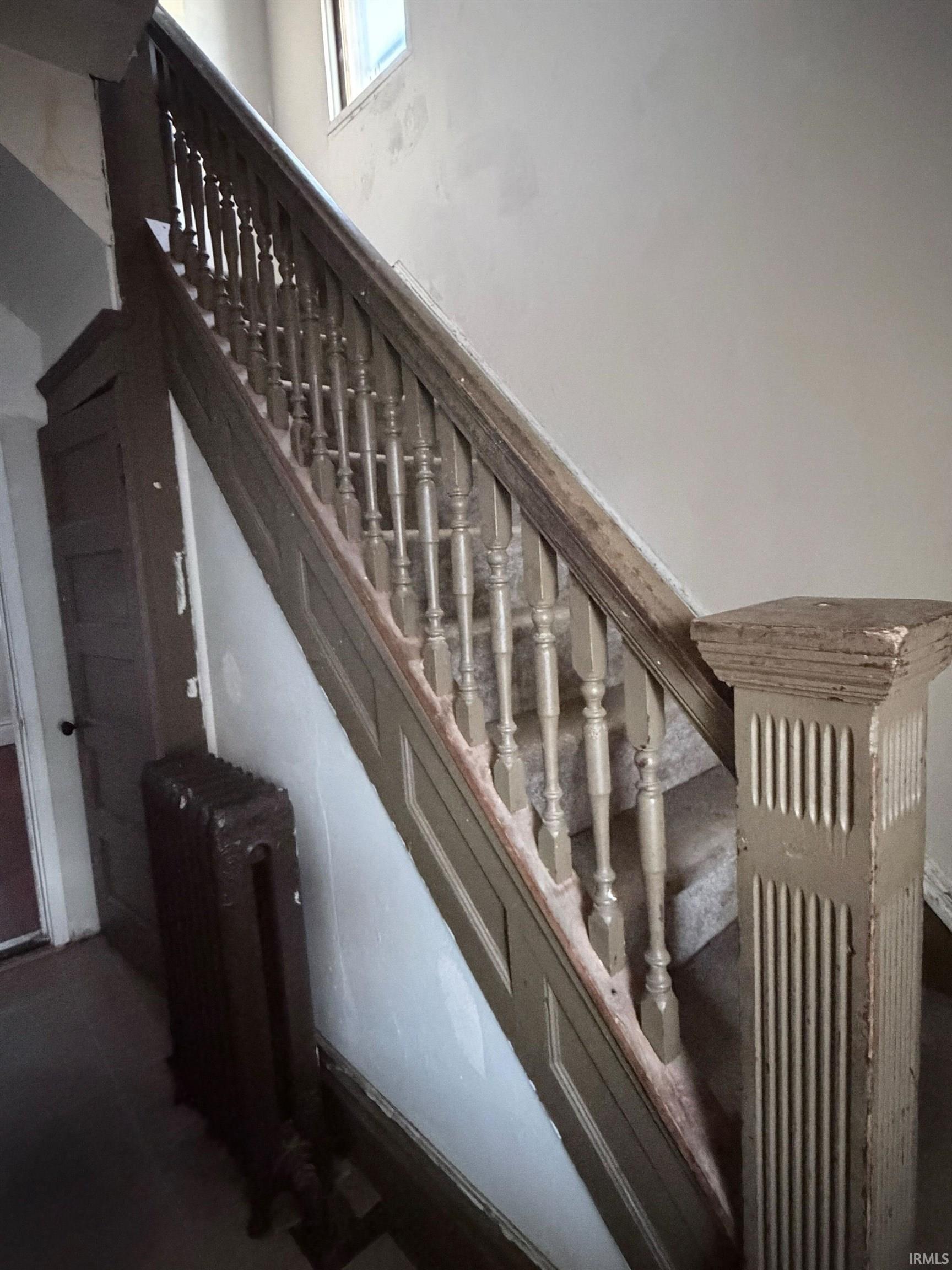 Stairs featuring radiator heating unit