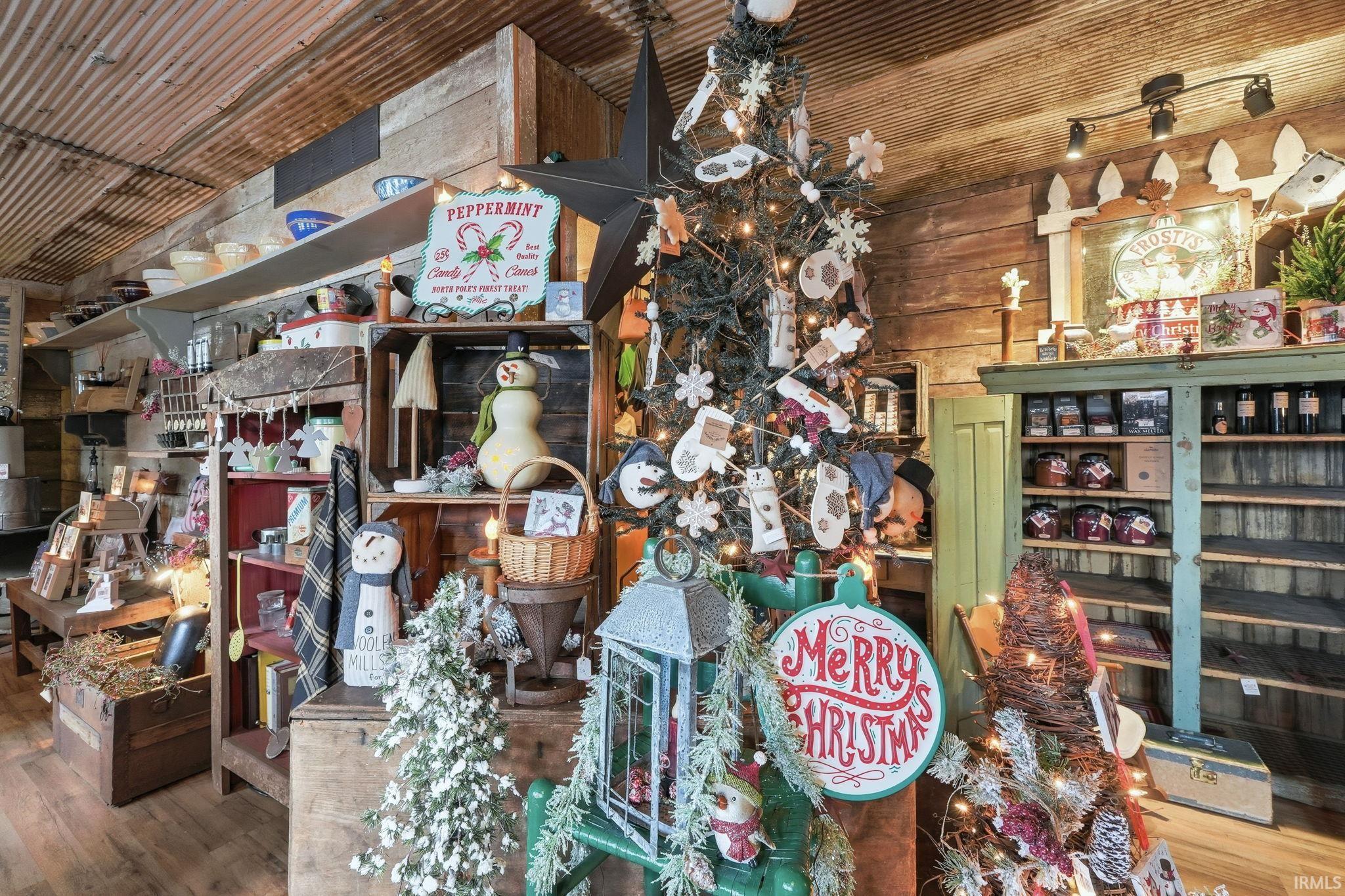 Miscellaneous room featuring wooden ceiling and wood walls