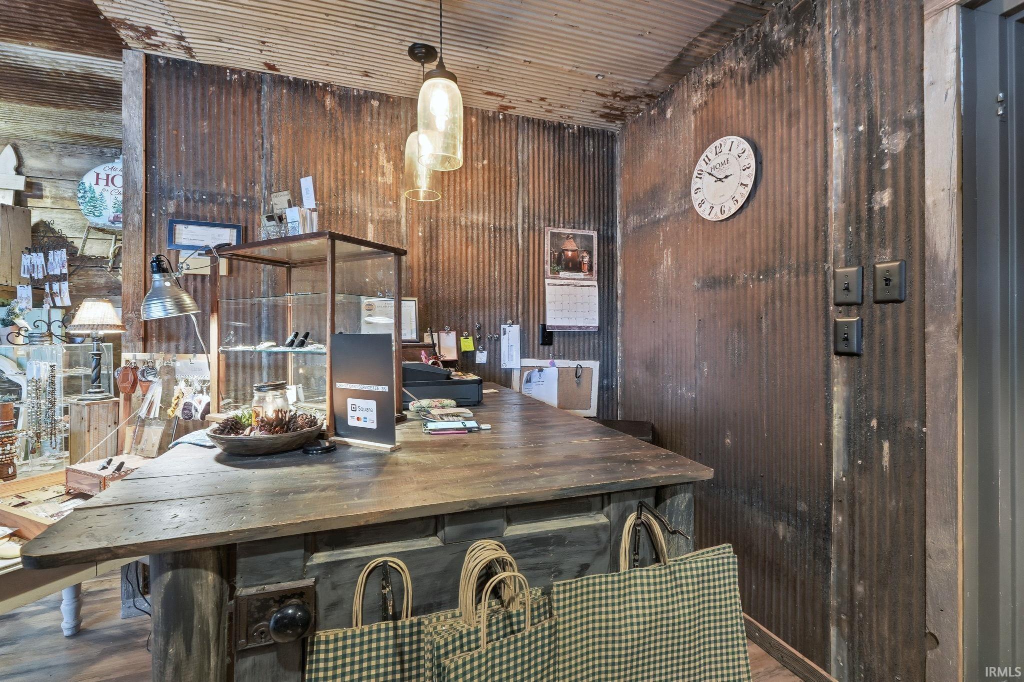 Dining room with wood walls