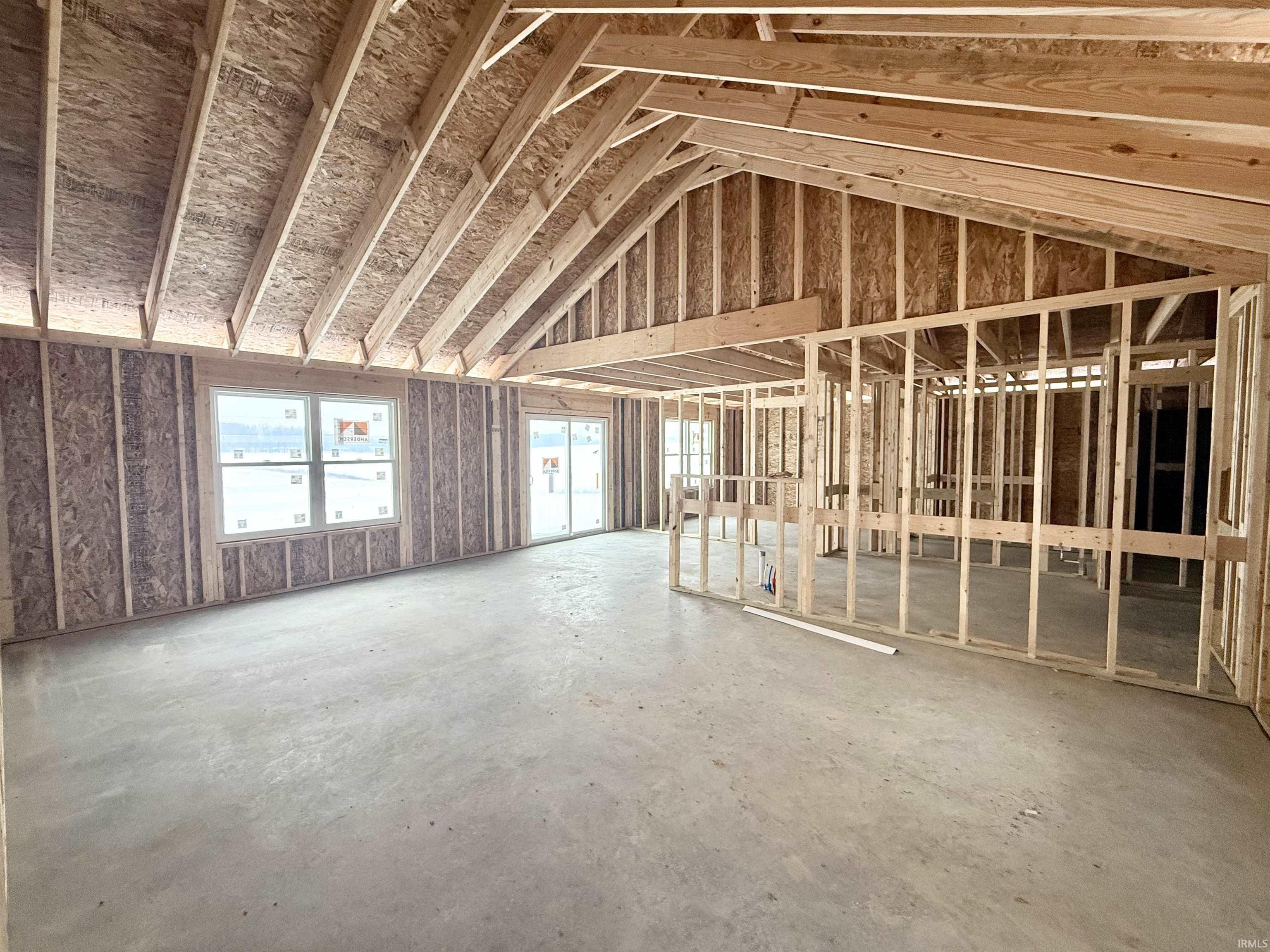 Misc room featuring lofted ceiling