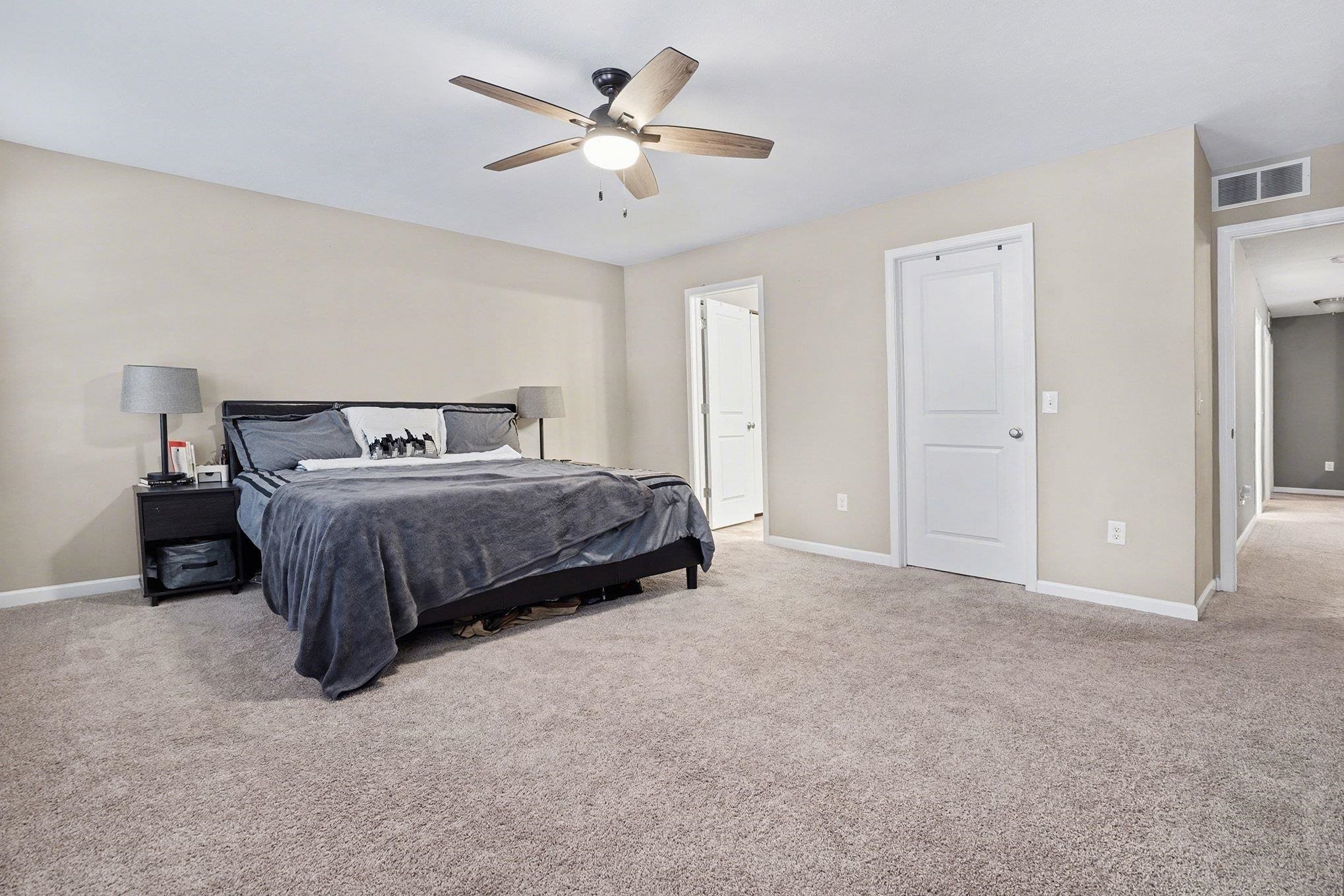 Oversized master bedroom with great natural lighting, private en-suite & walk-in closet!