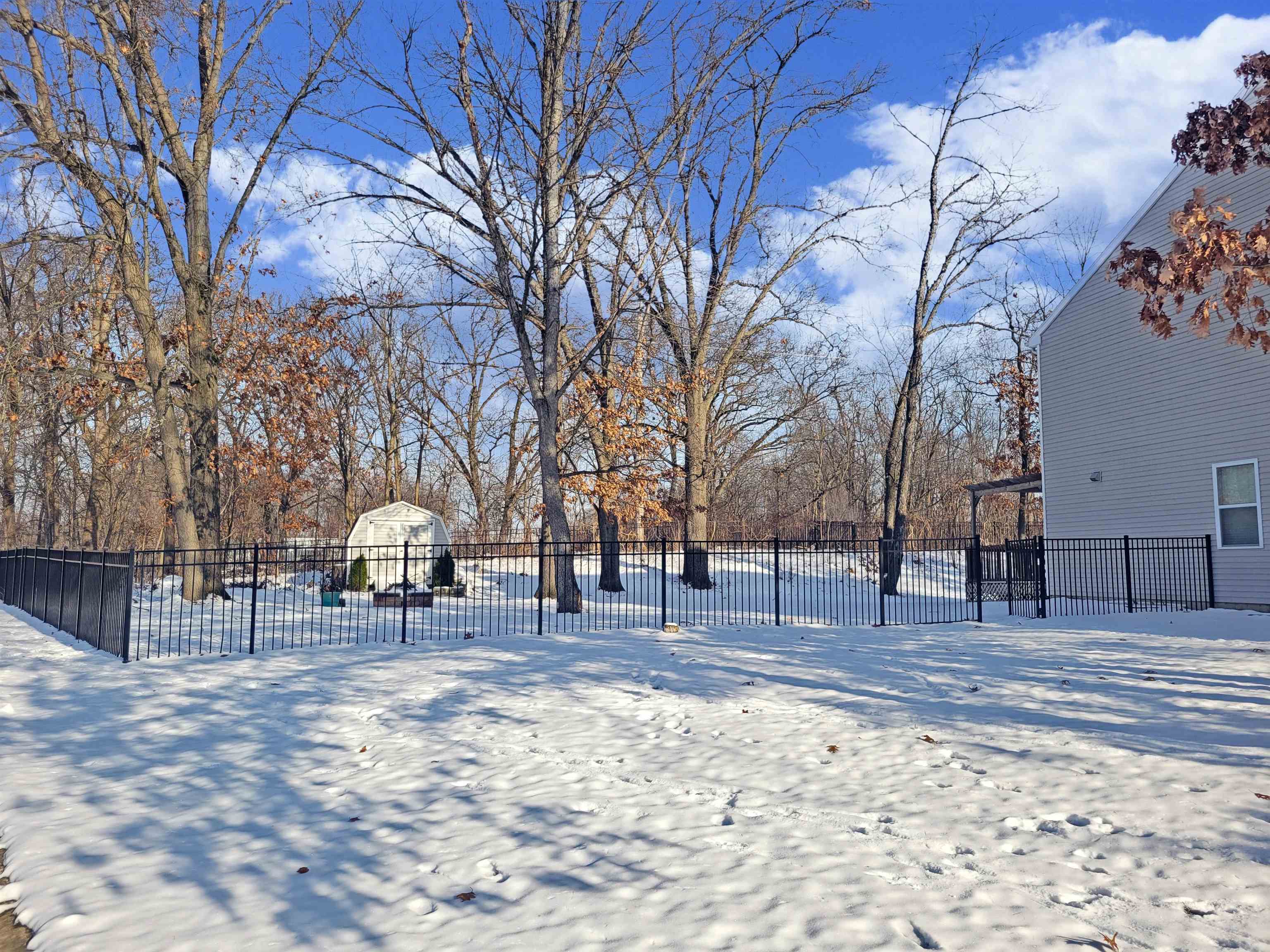 View of yard layered in snow