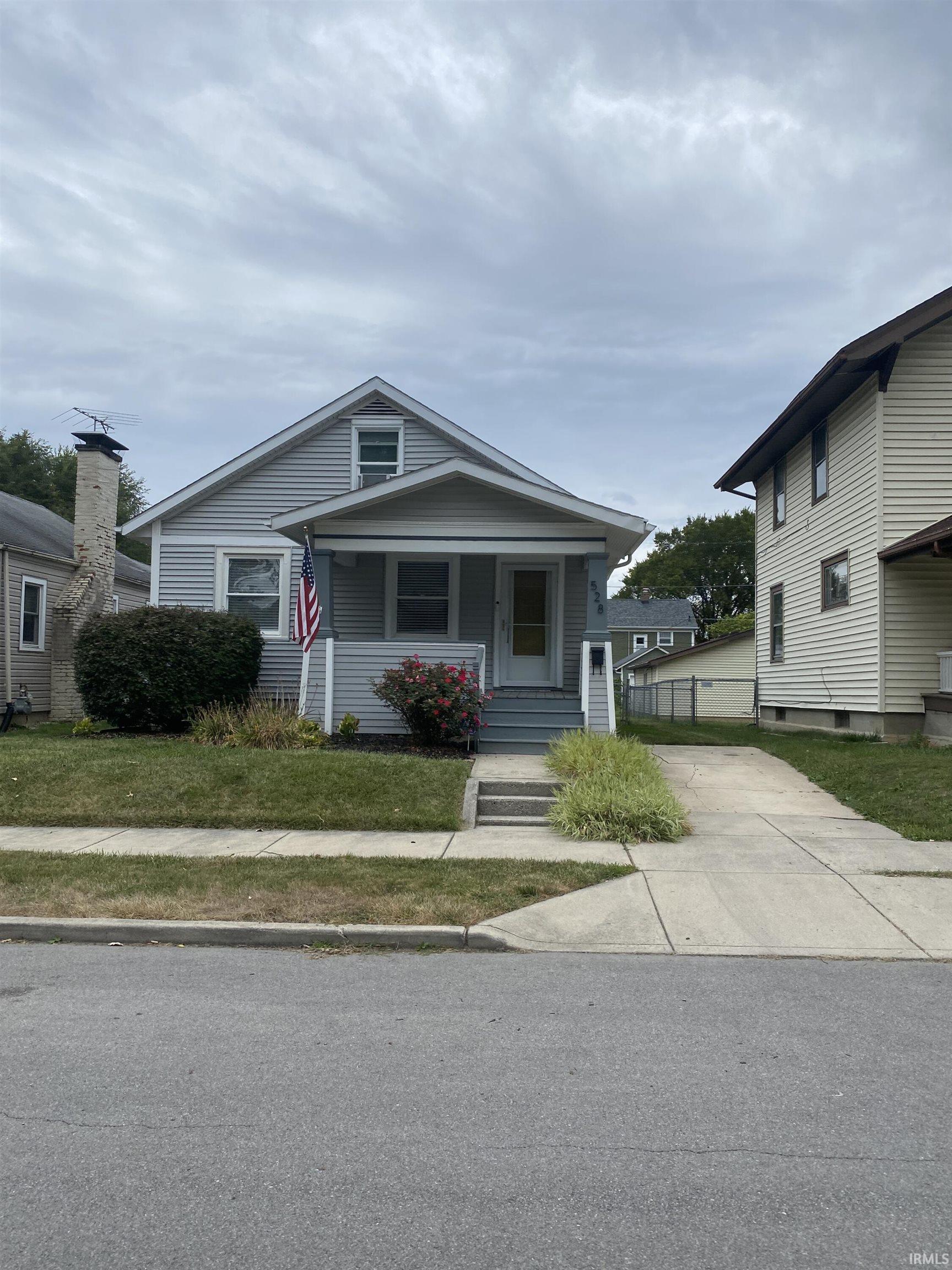 View of front of property featuring a porch