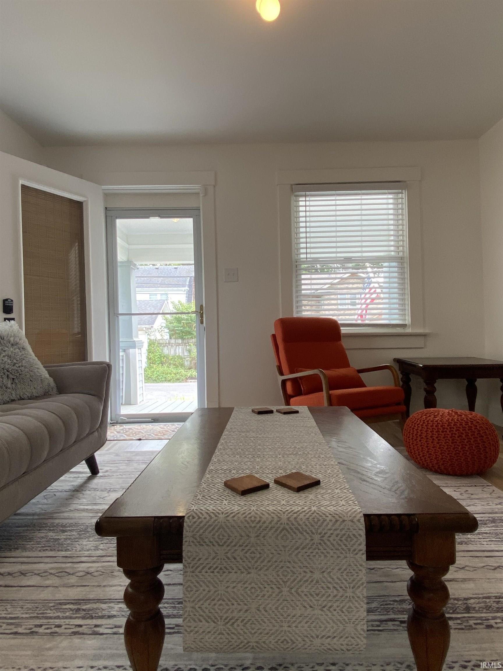 Dining space featuring plenty of natural light and wood finished floors