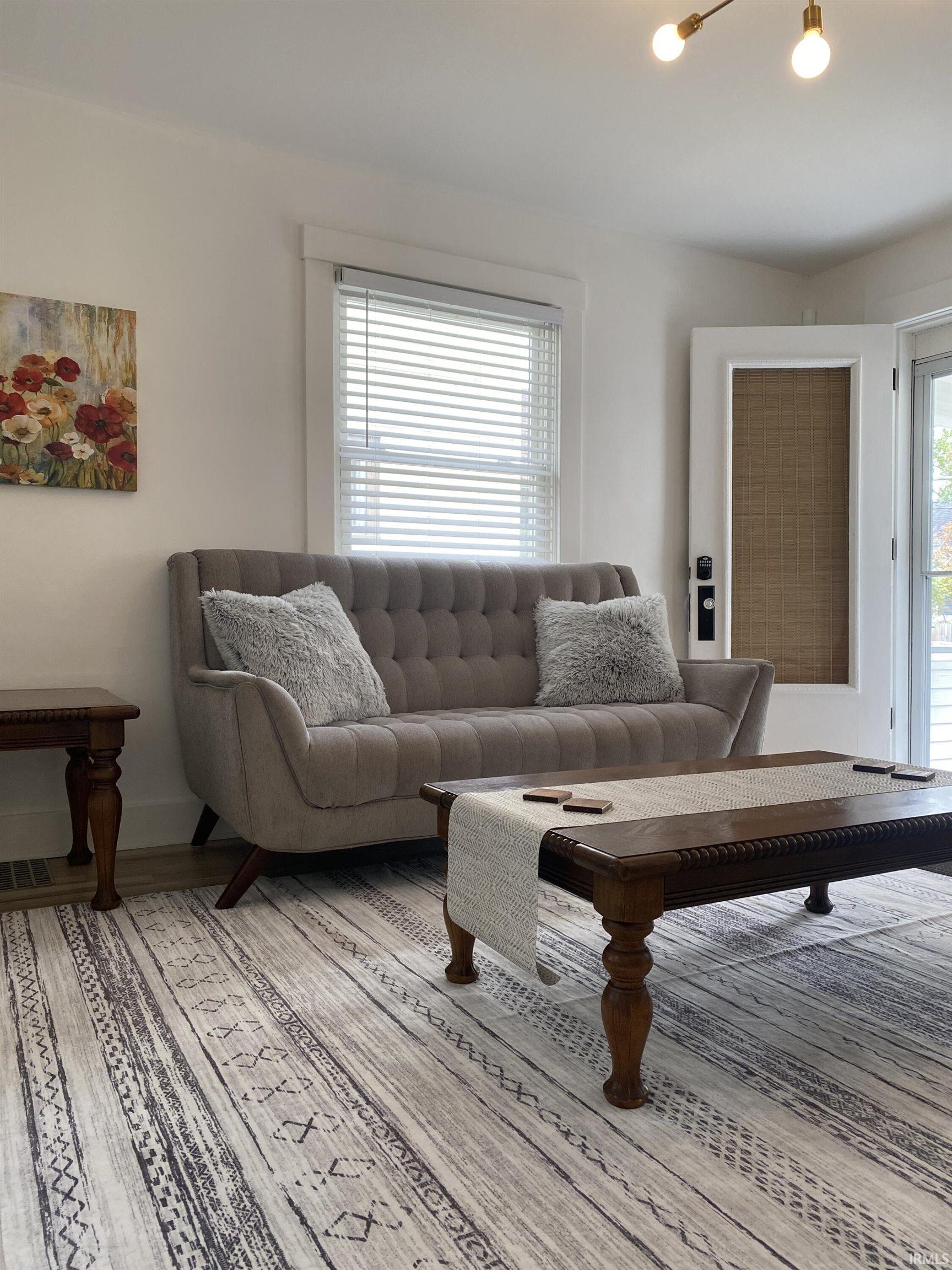 Living area with wood finished floors