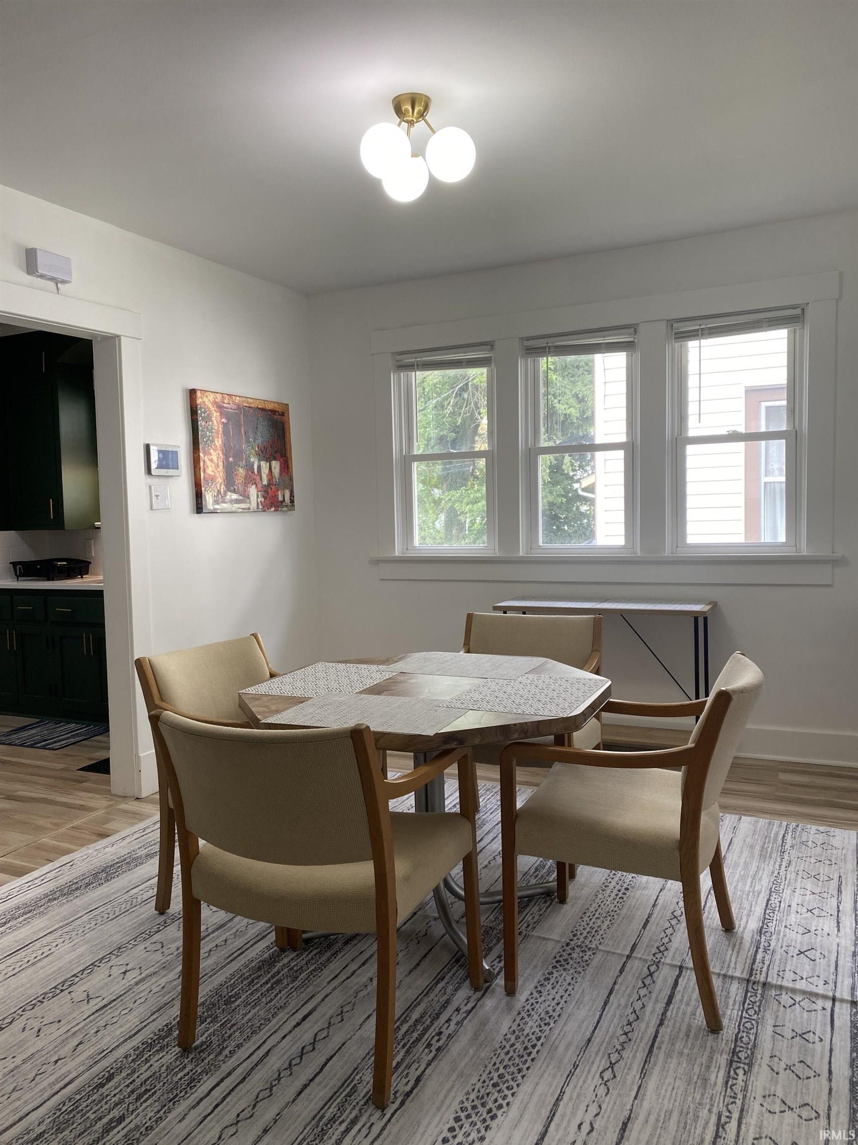 Dining area featuring light wood-type flooring