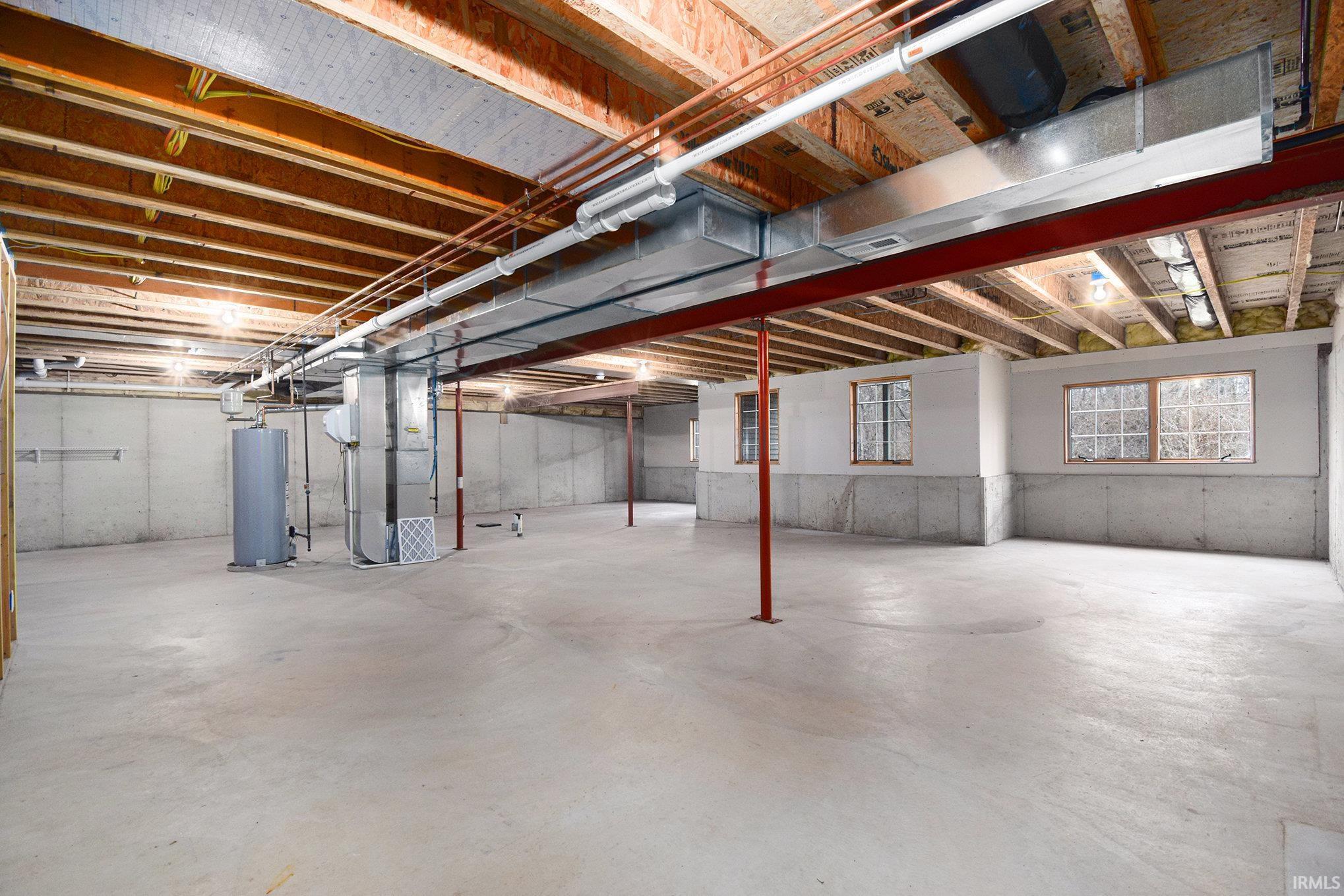 Basement with heating unit and water heater