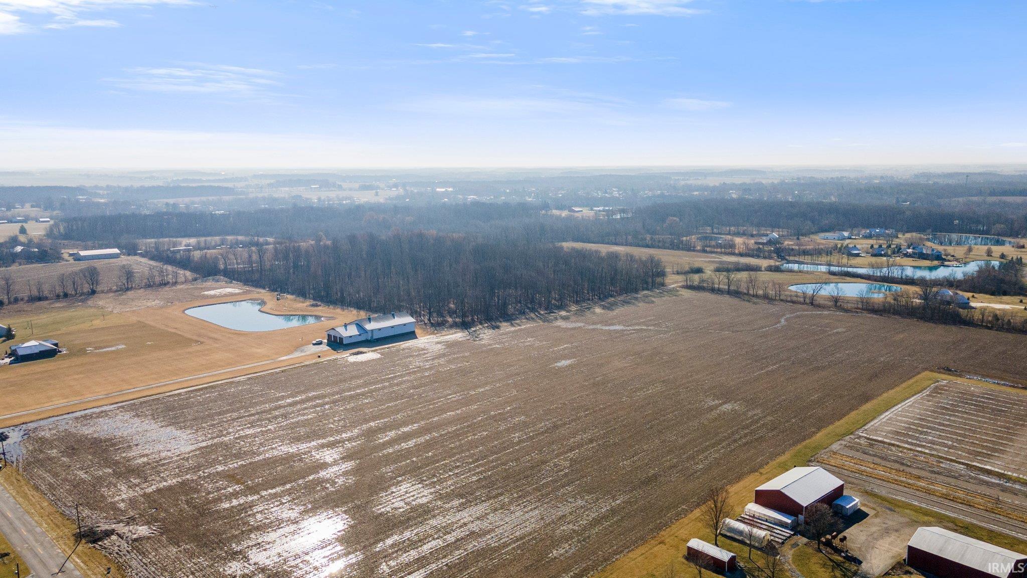 View of rural area featuring large plots for crops