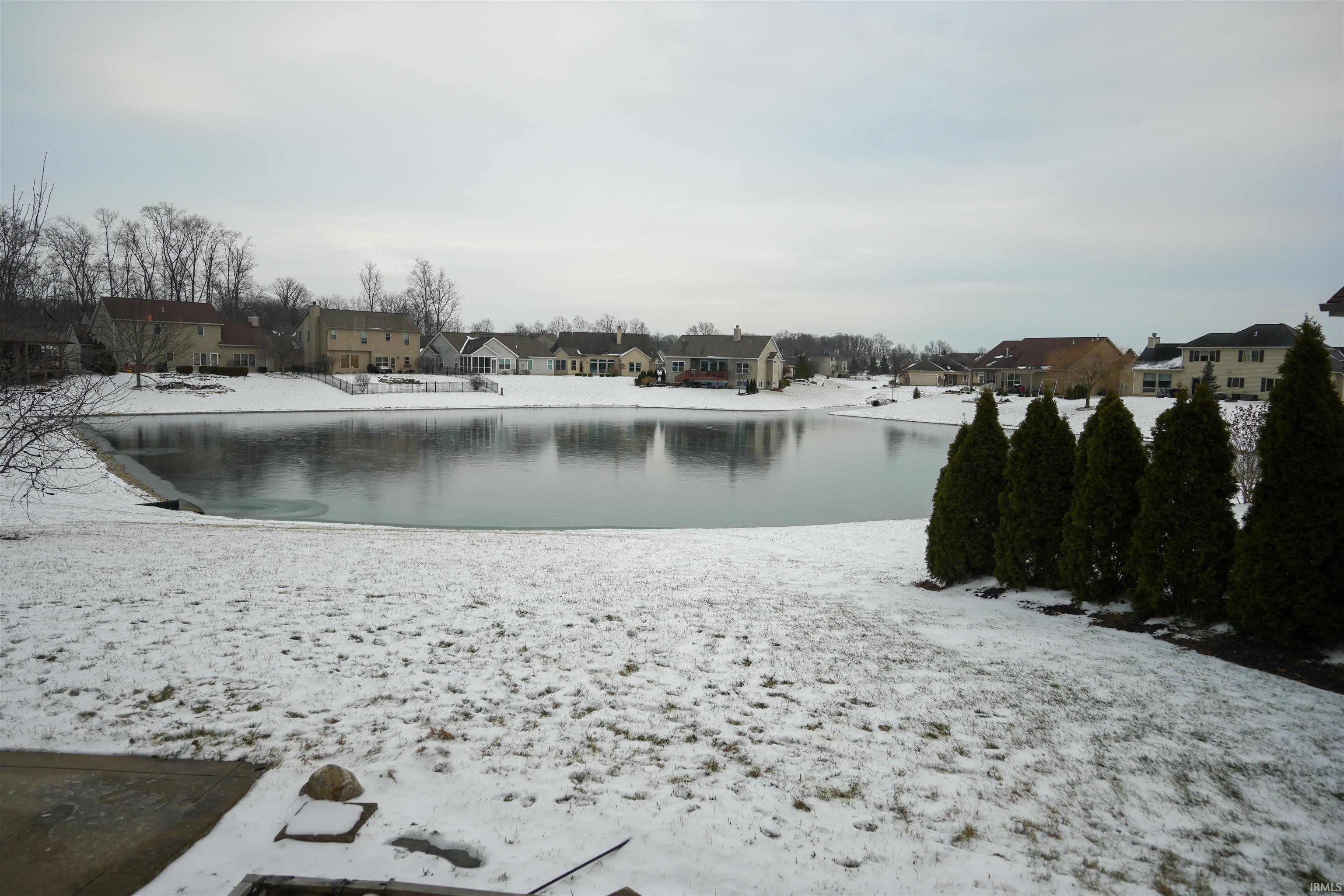 Water view with nearby suburban area