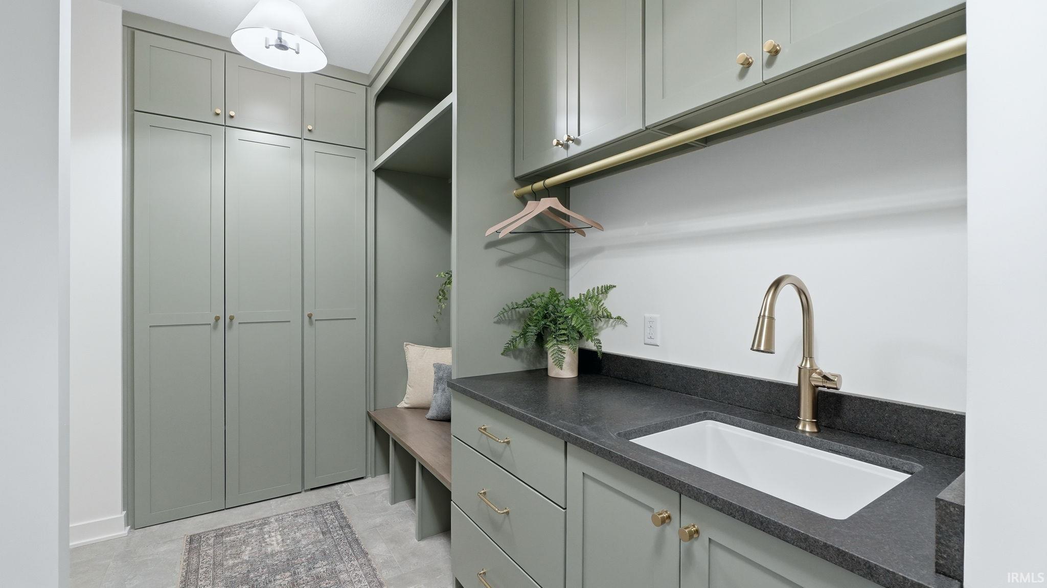 Laundry room with a sink