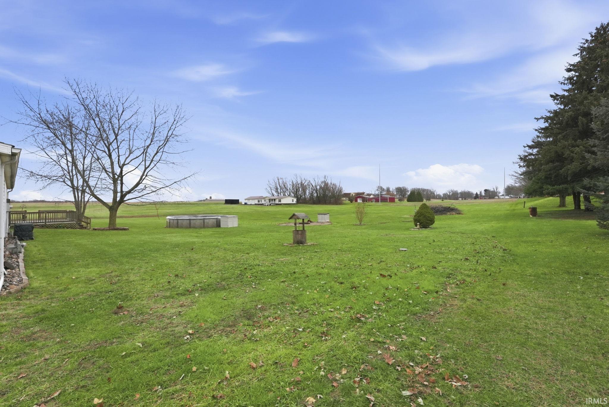View of green lawn with a view of rural / pastoral area