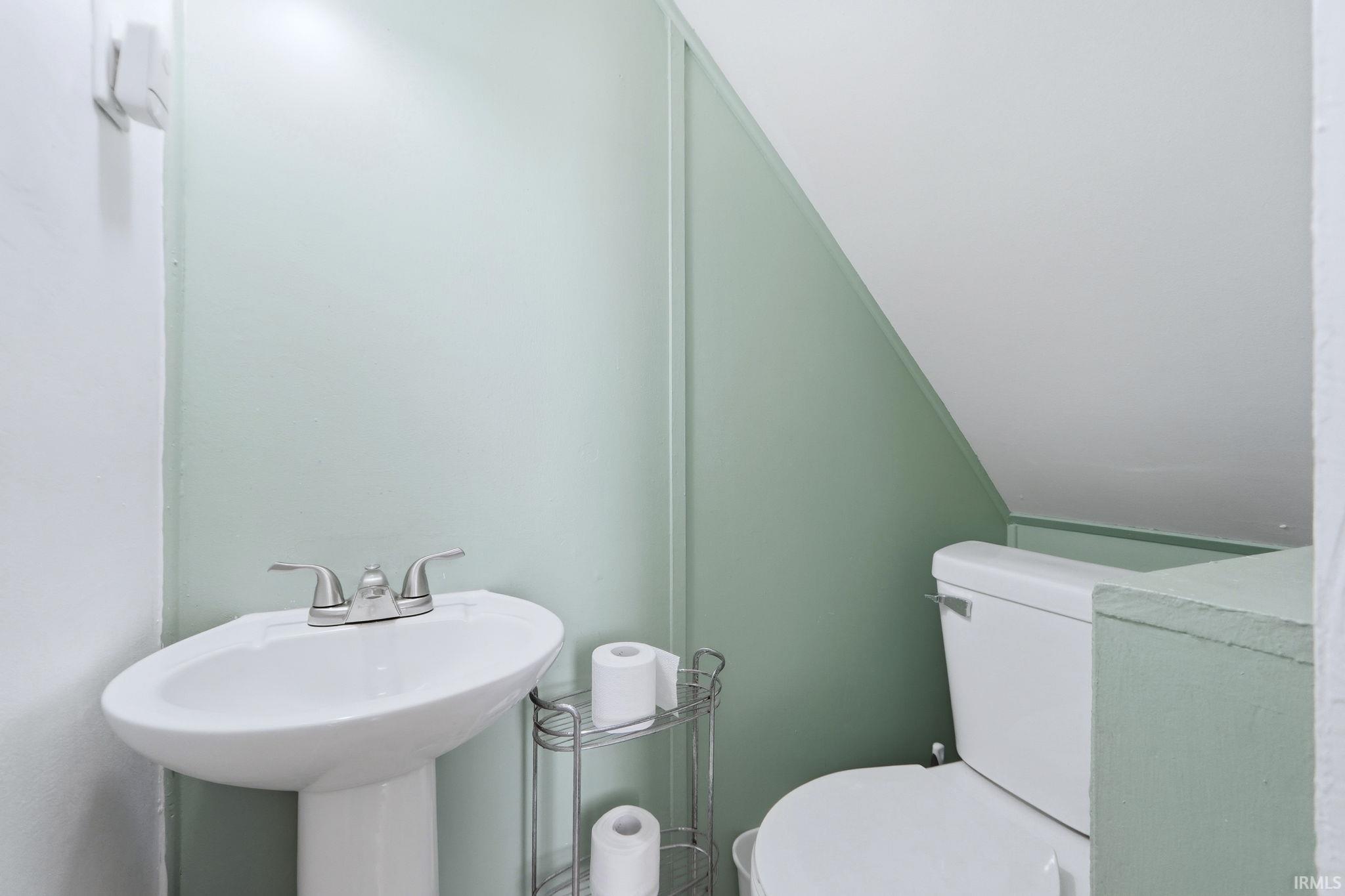 Half bathroom with toilet