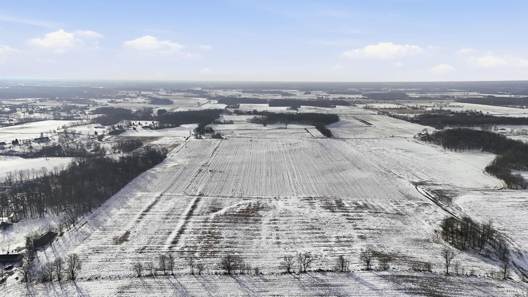 View of rural area featuring large plots for crops