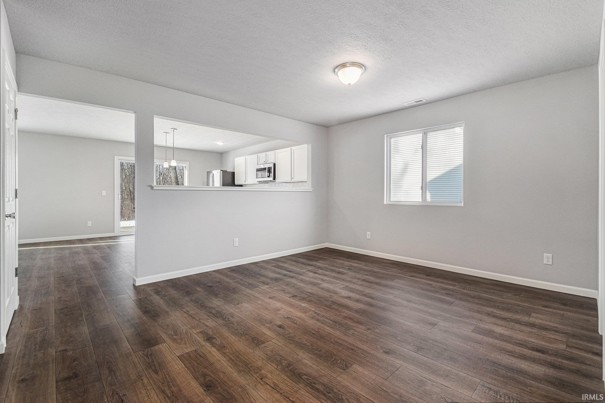 Large dining nook can serve as a formal & informal space since it can accommodate various table sizes and shapes.