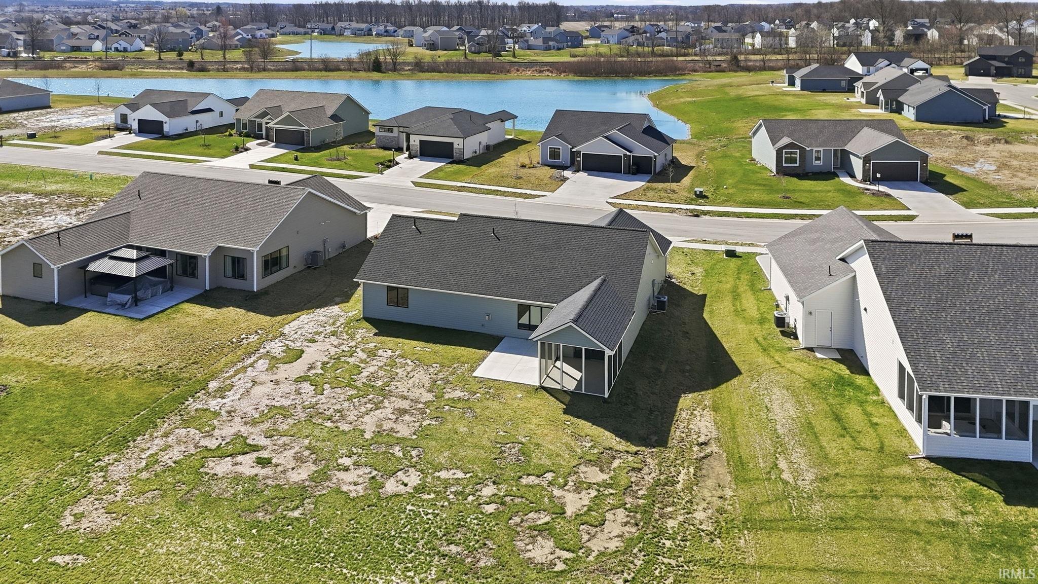 Aerial view of residential area with a nearby body of water