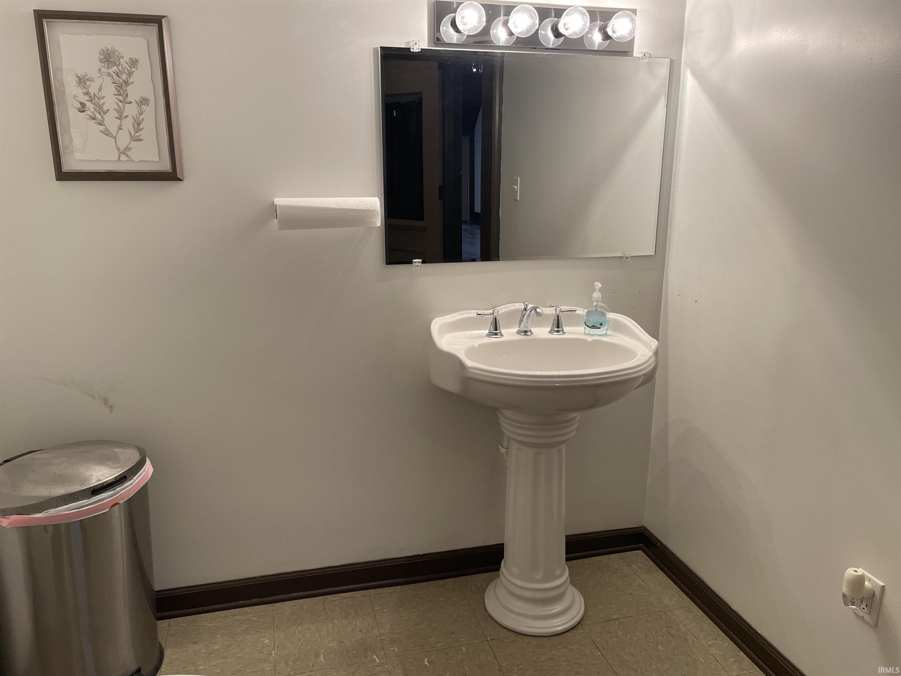 Half bath with baseboards