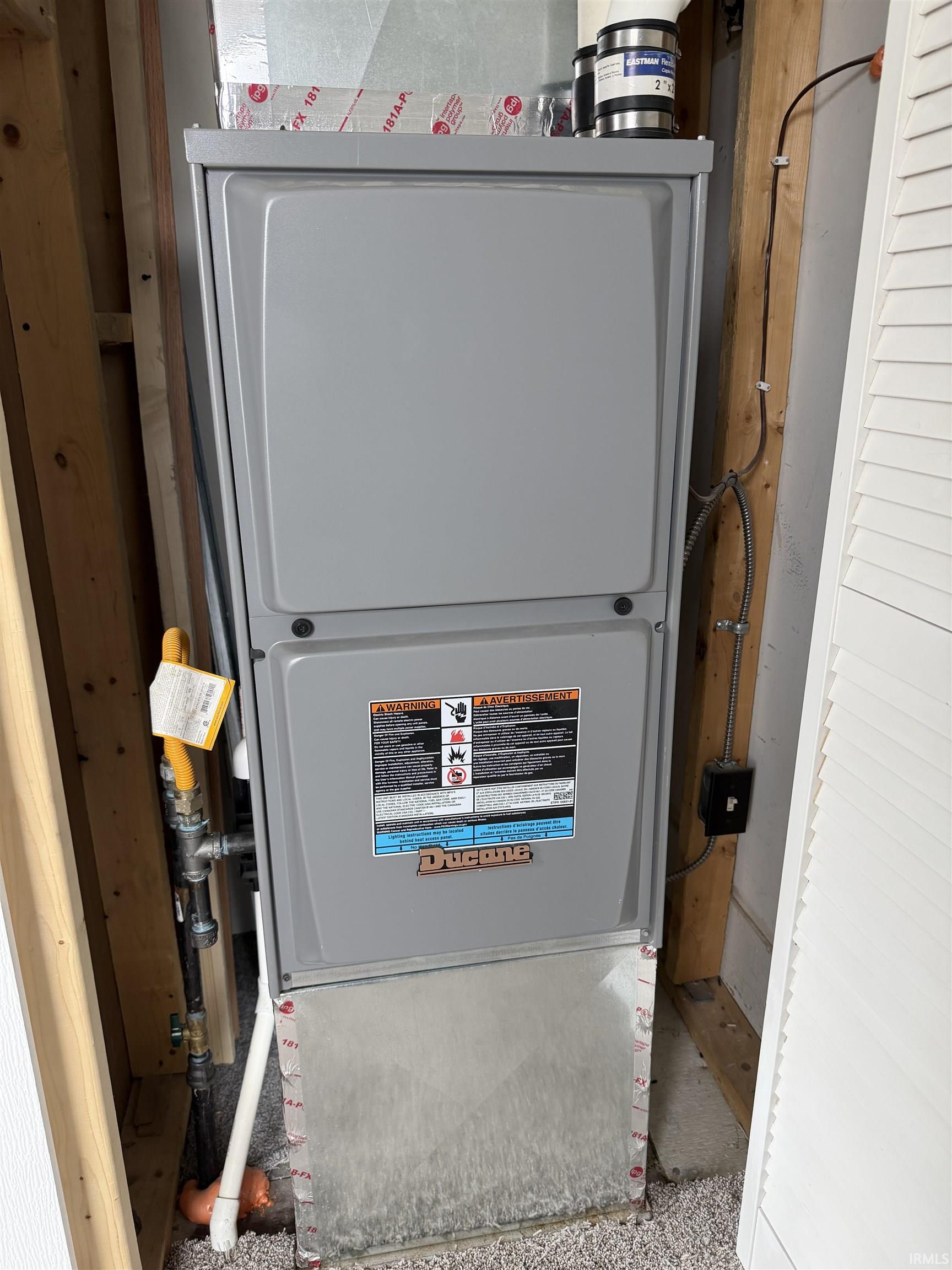 Utility room featuring New Furnace
