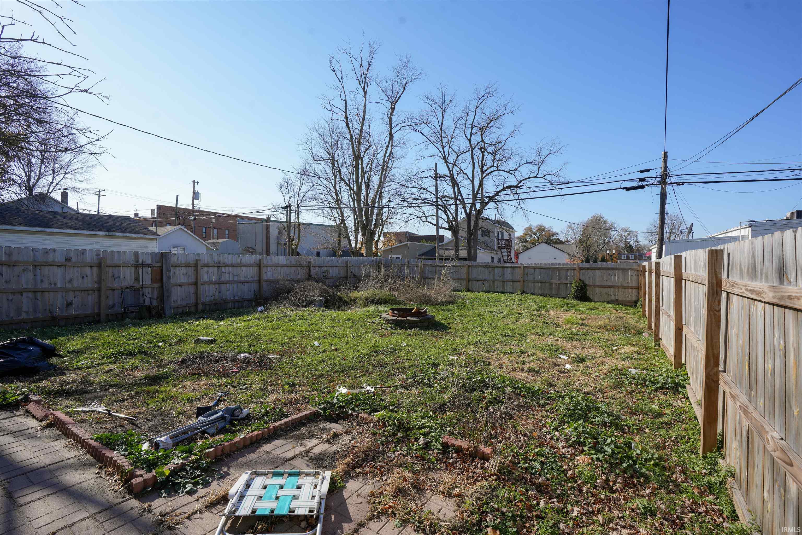 View of fenced backyard