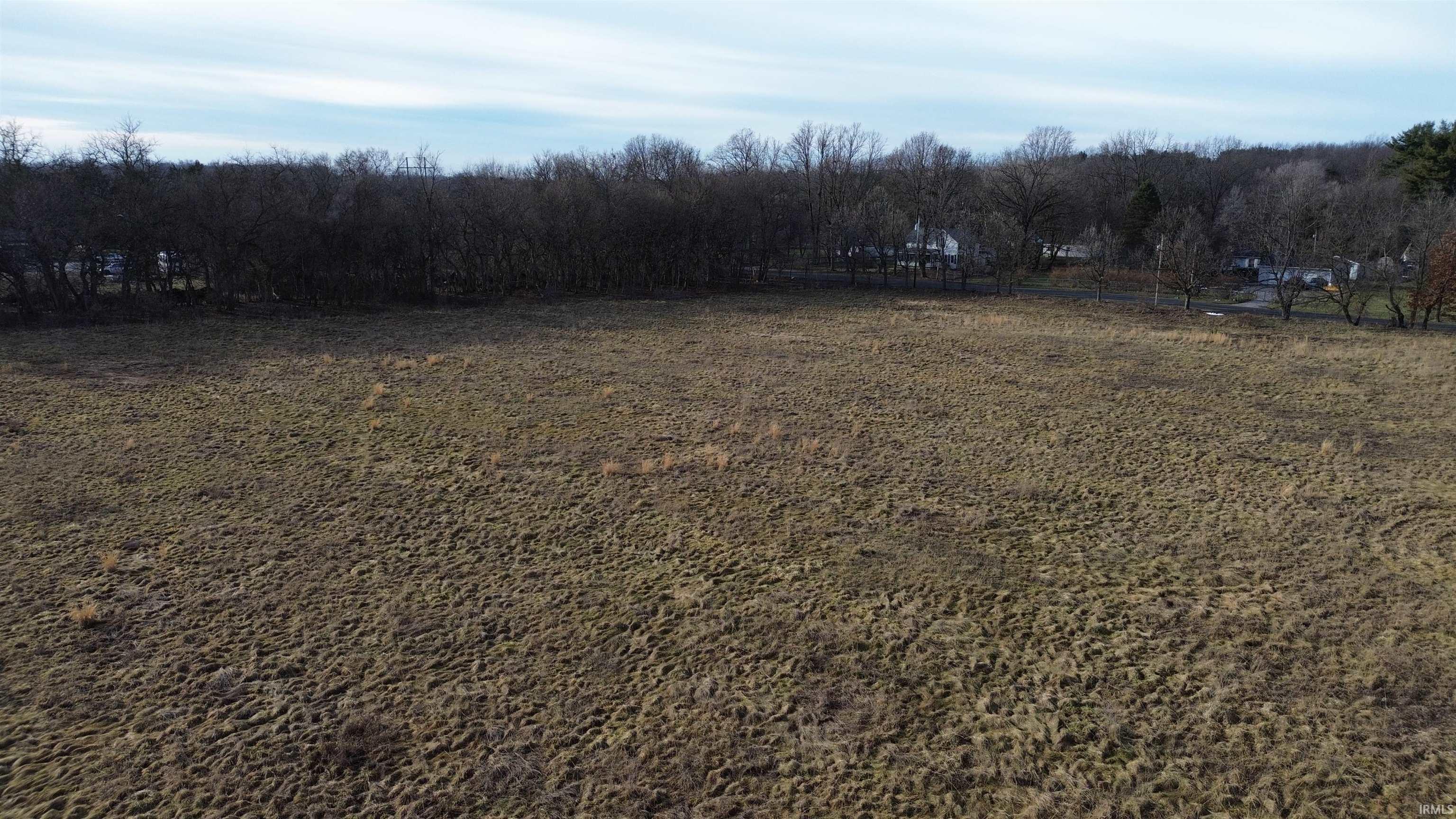 View of yard with a rural view
