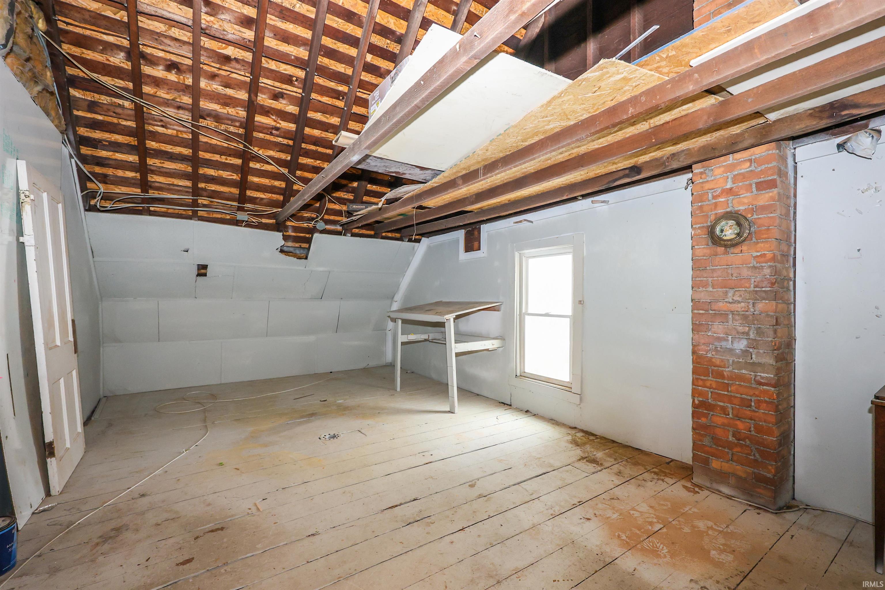 Below grade area featuring light wood finished floors