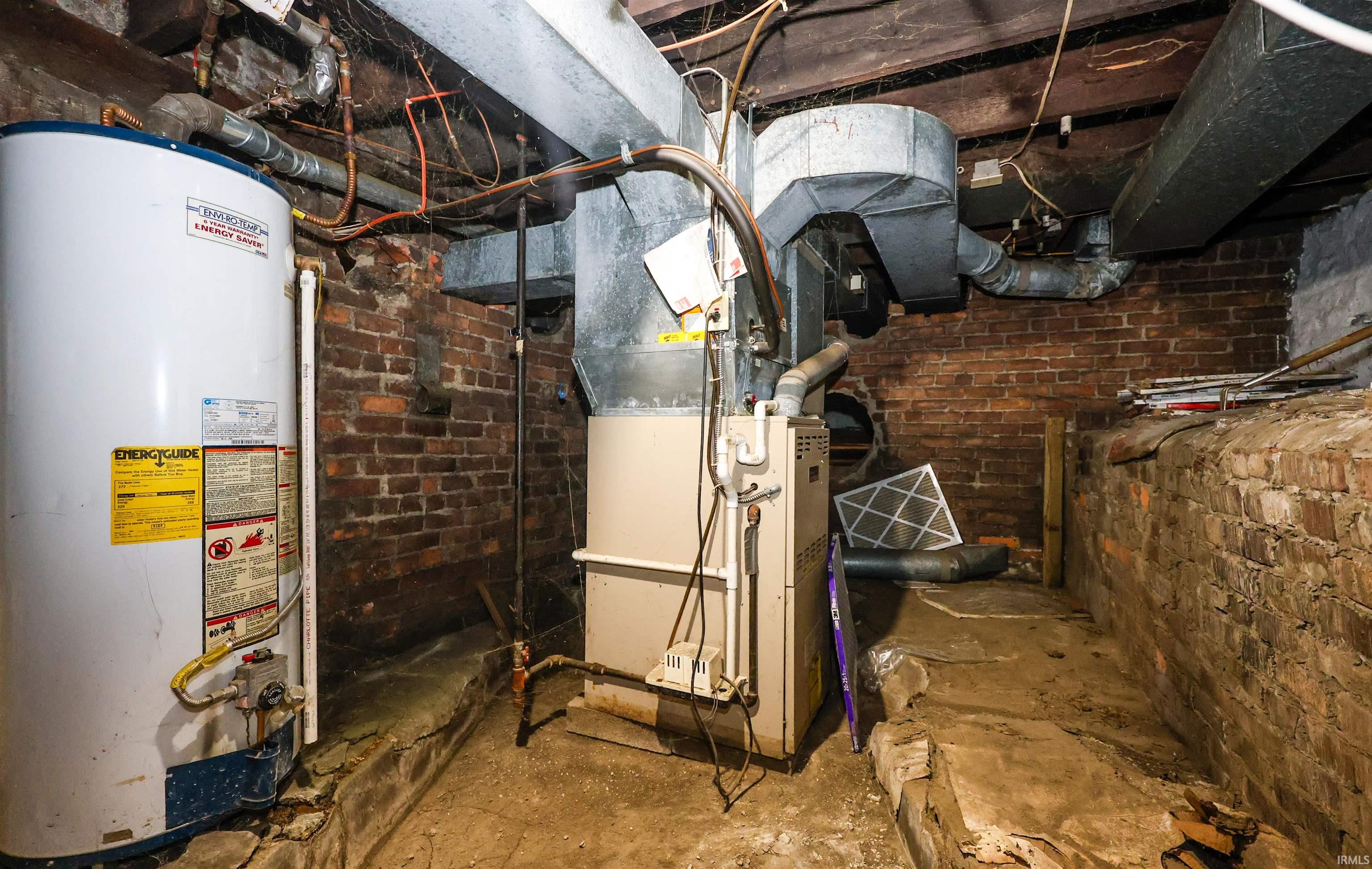 Utilities featuring gas water heater and heating unit