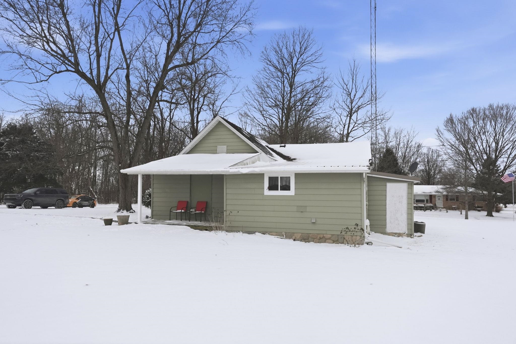 Rear of house with covered porch