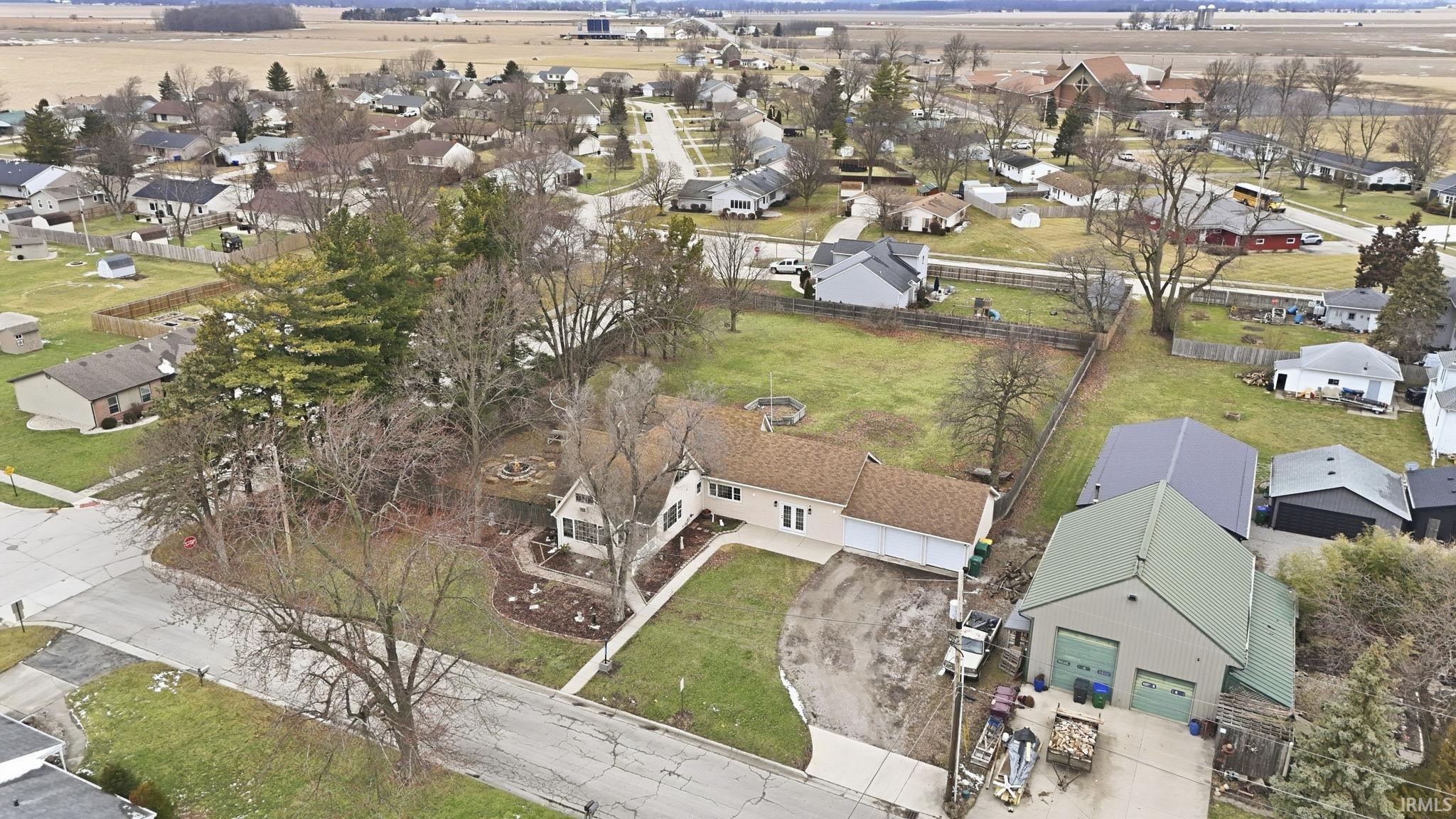 View of property location with nearby suburban area