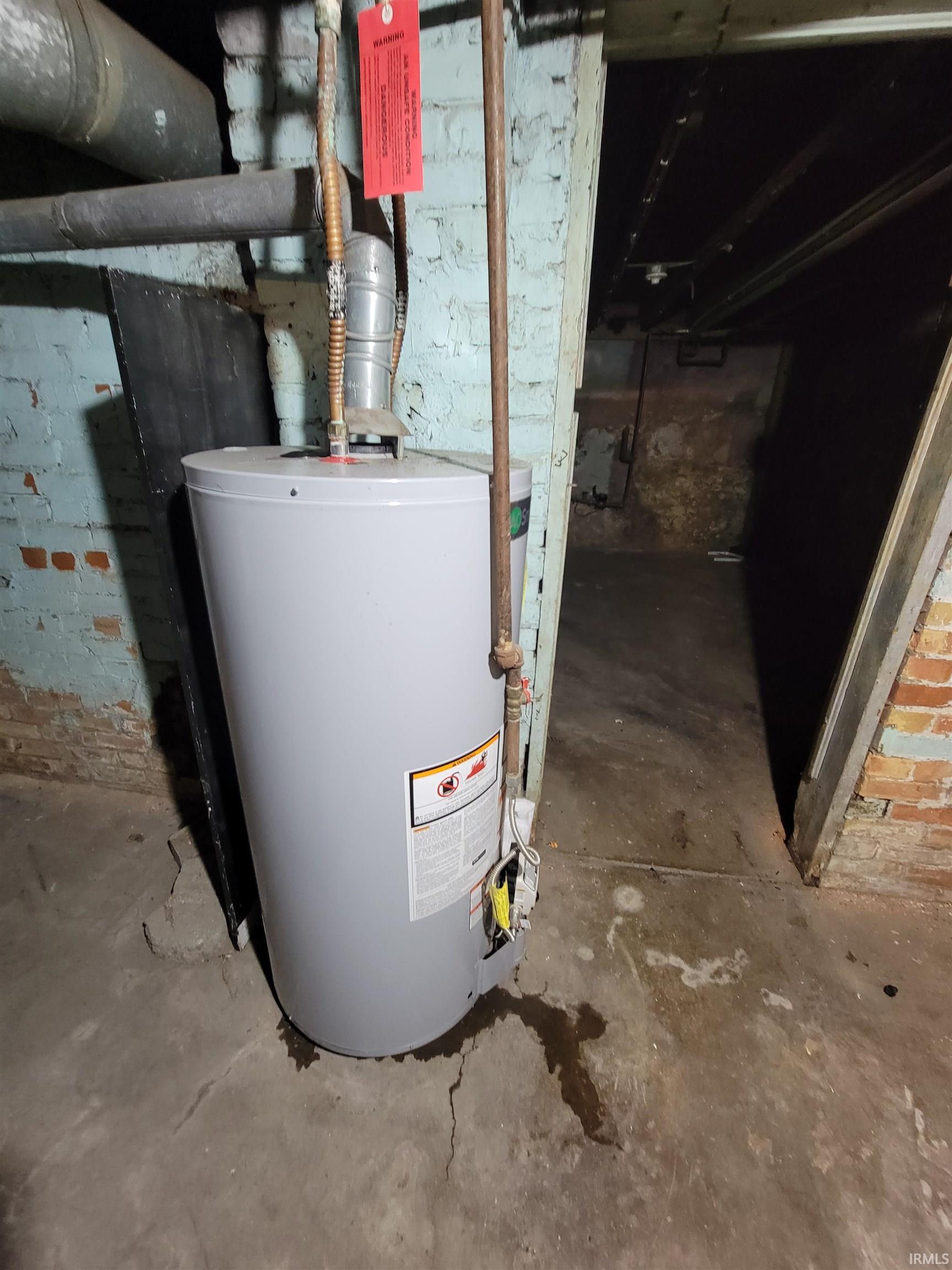 Utility room with gas water heater