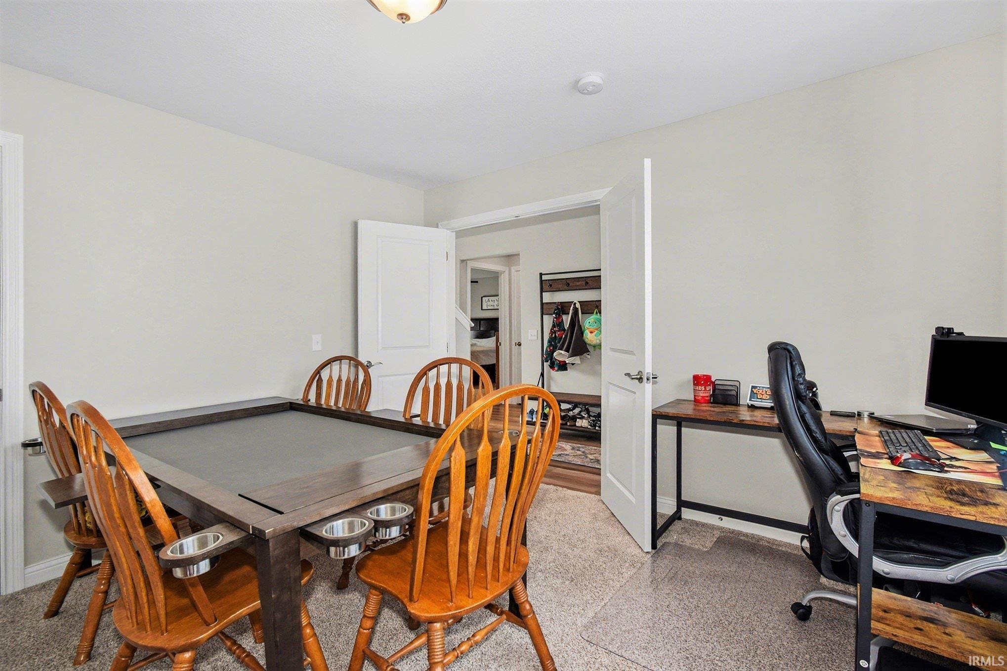 Dining space featuring an office area and baseboards