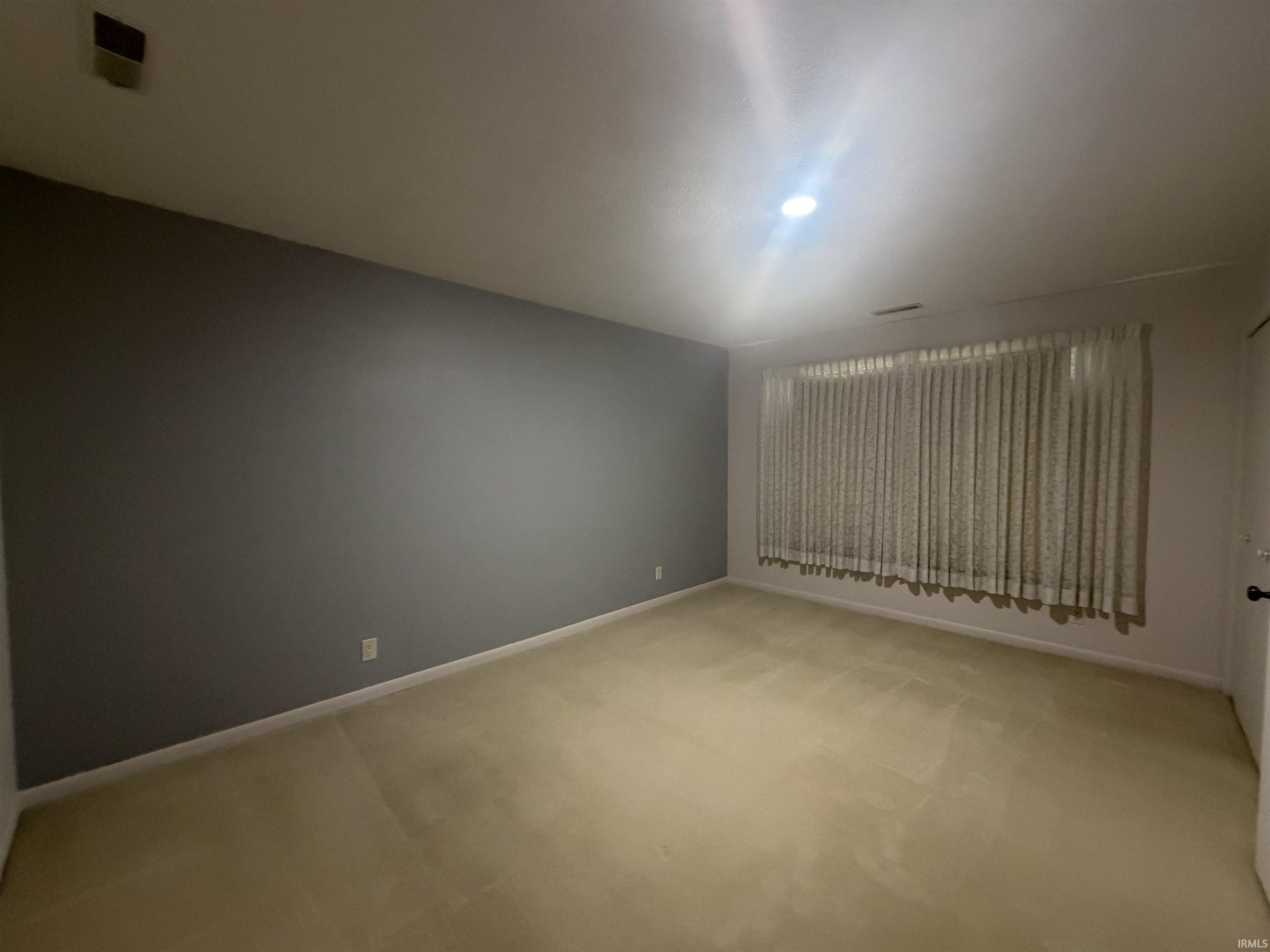 Master bedroom facing east with blackout blinds