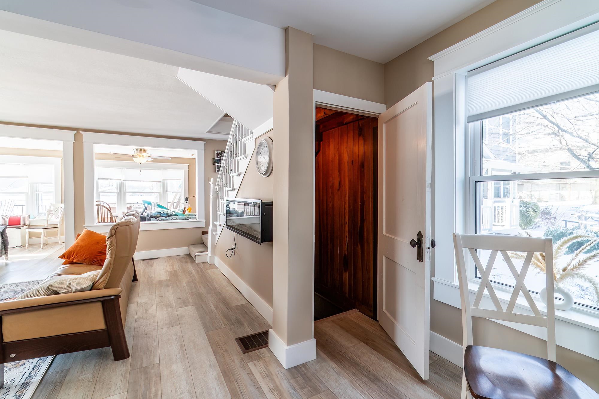 Hallway featuring baseboards and light wood finished floors
