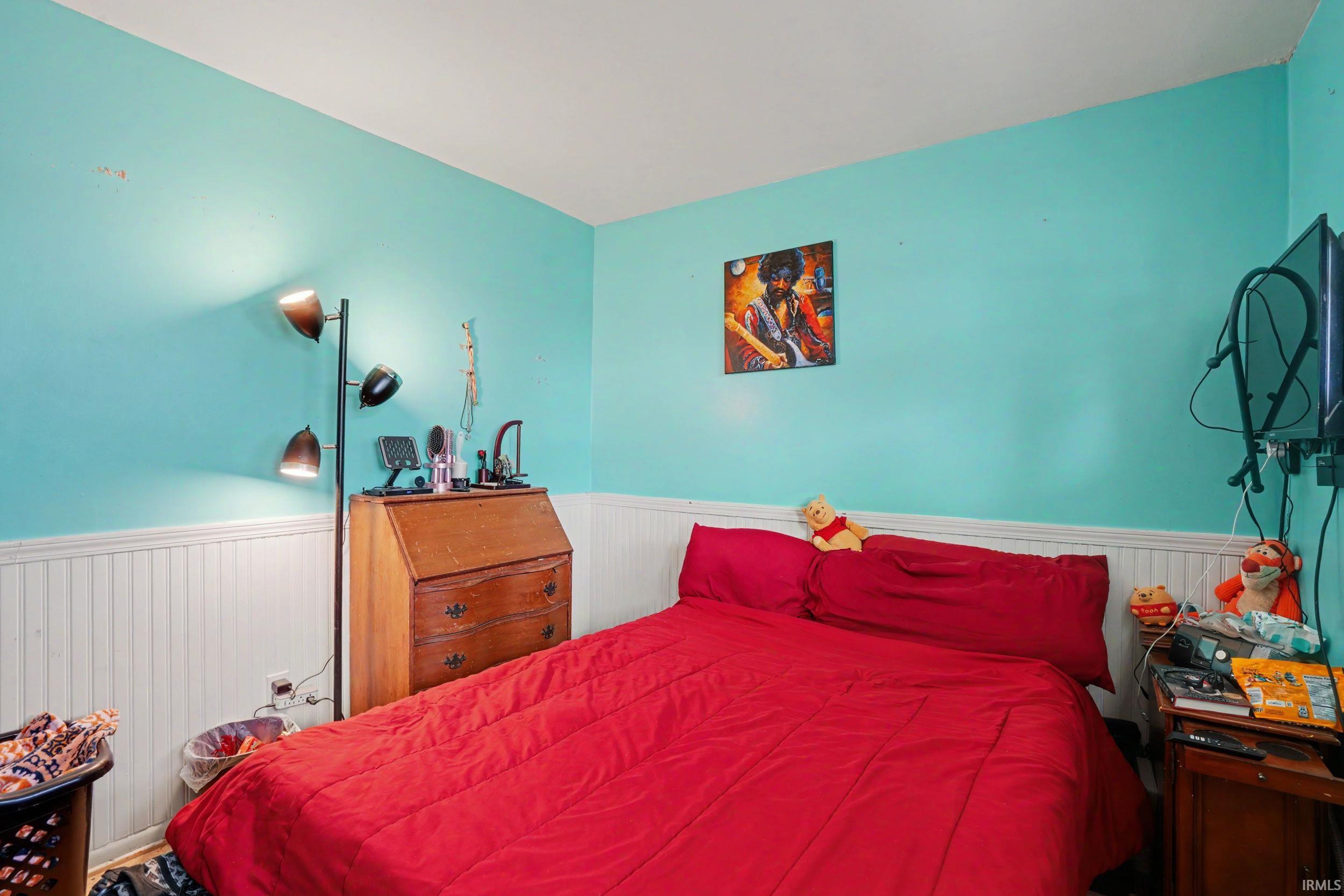 Bedroom with wainscoting