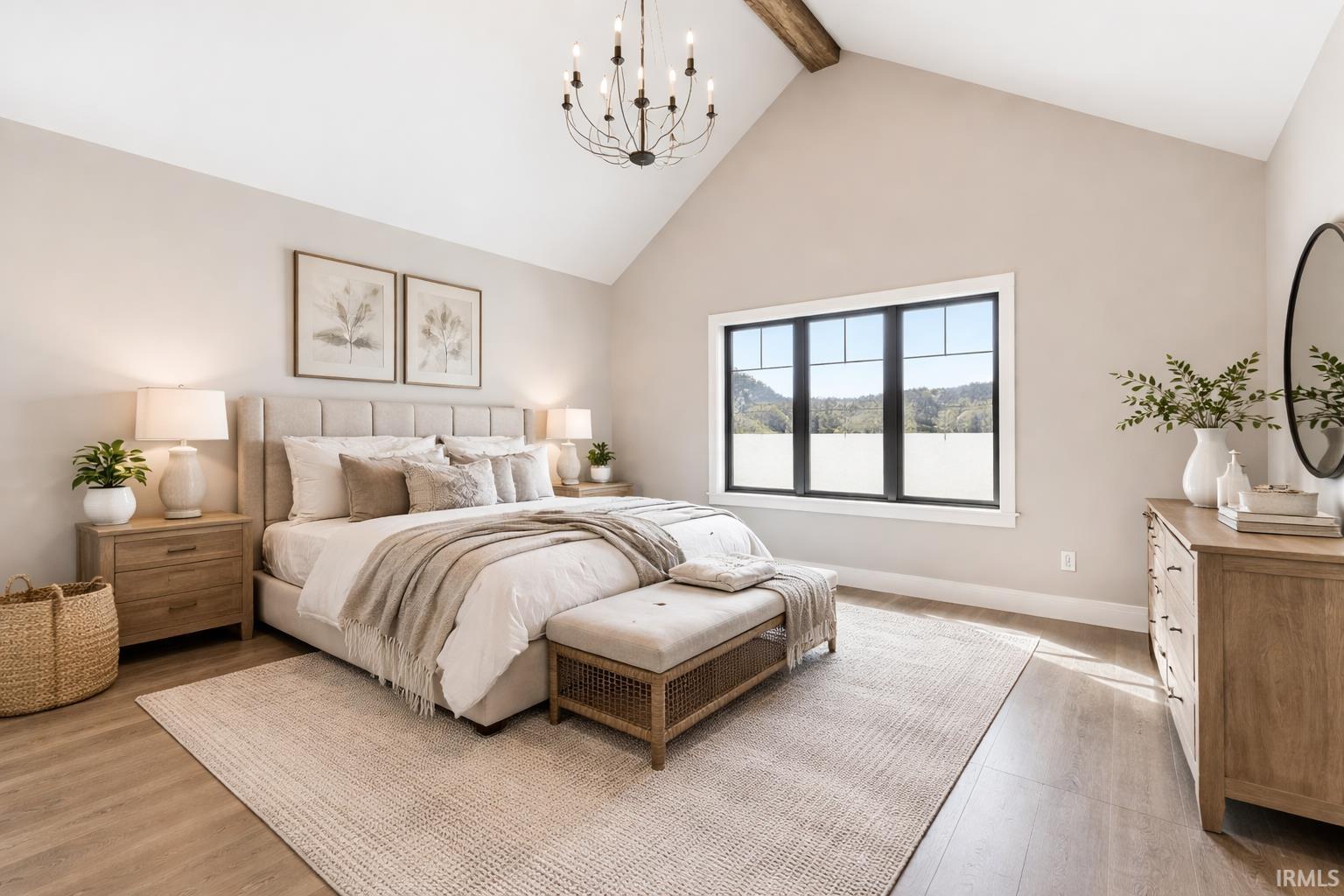 Staged by AI-Bedroom featuring high vaulted ceiling, beamed ceiling, light wood-type flooring, and a chandelier