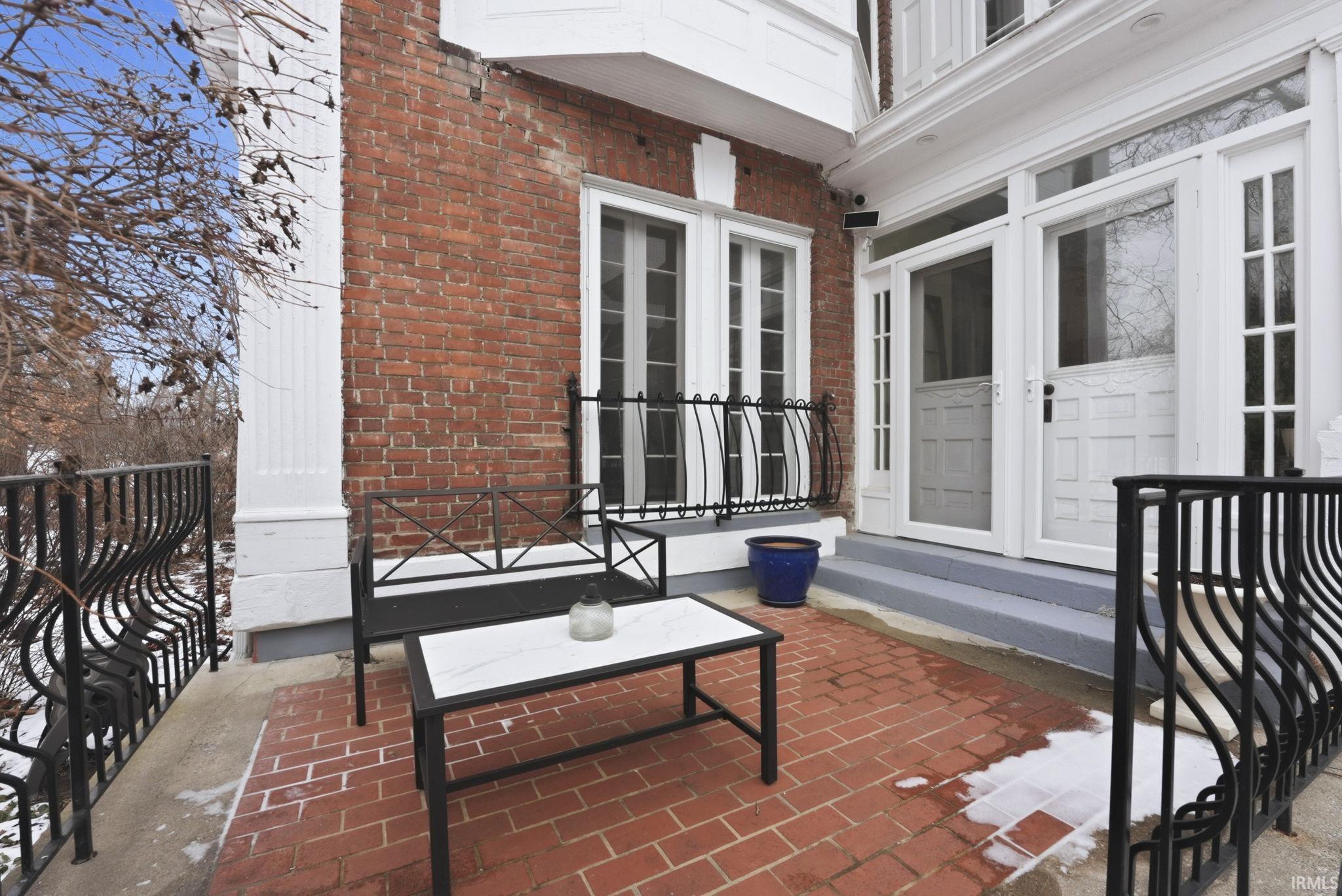 View of patio featuring french doors