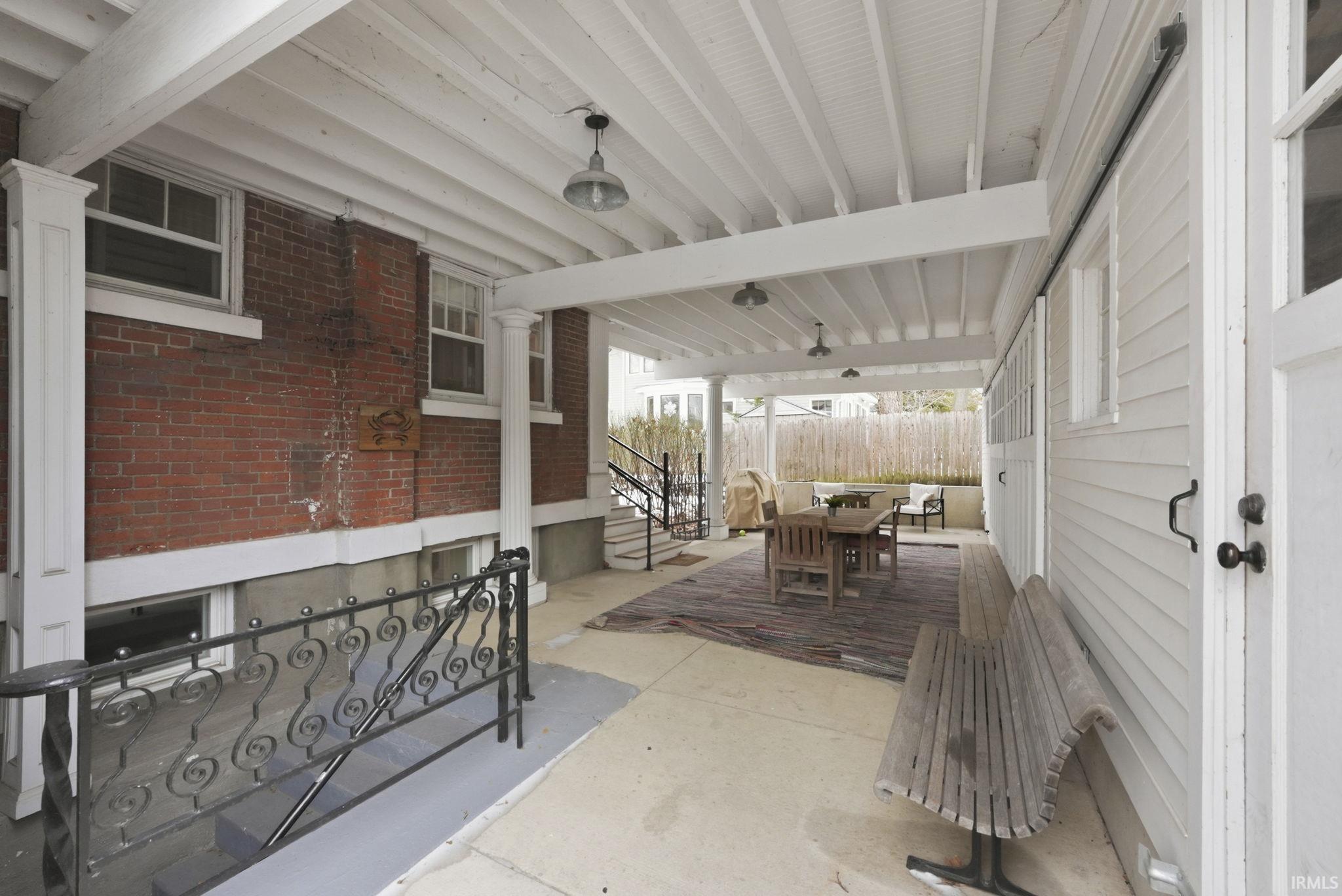 View of patio with outdoor dining area