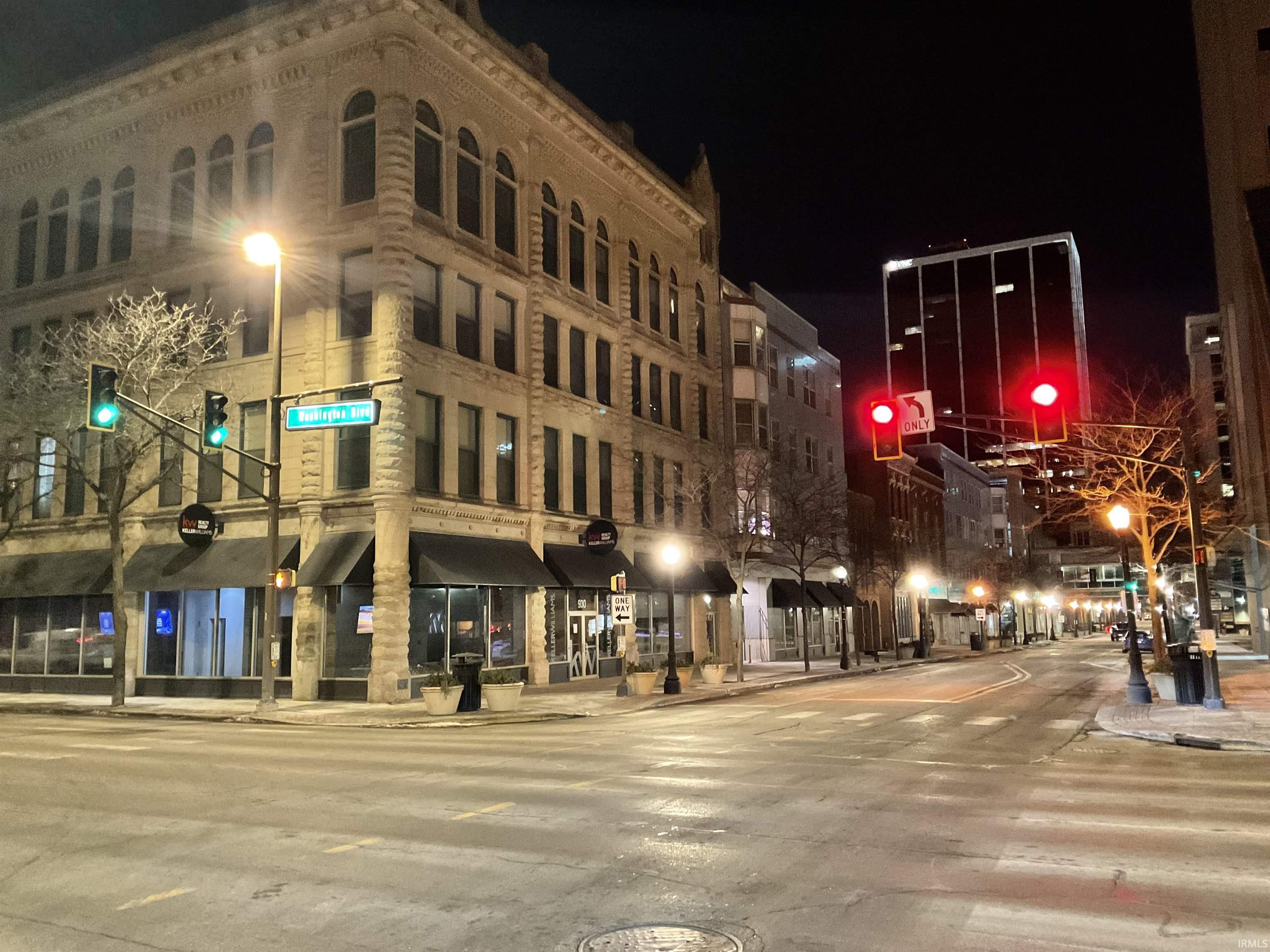 View of property at twilight