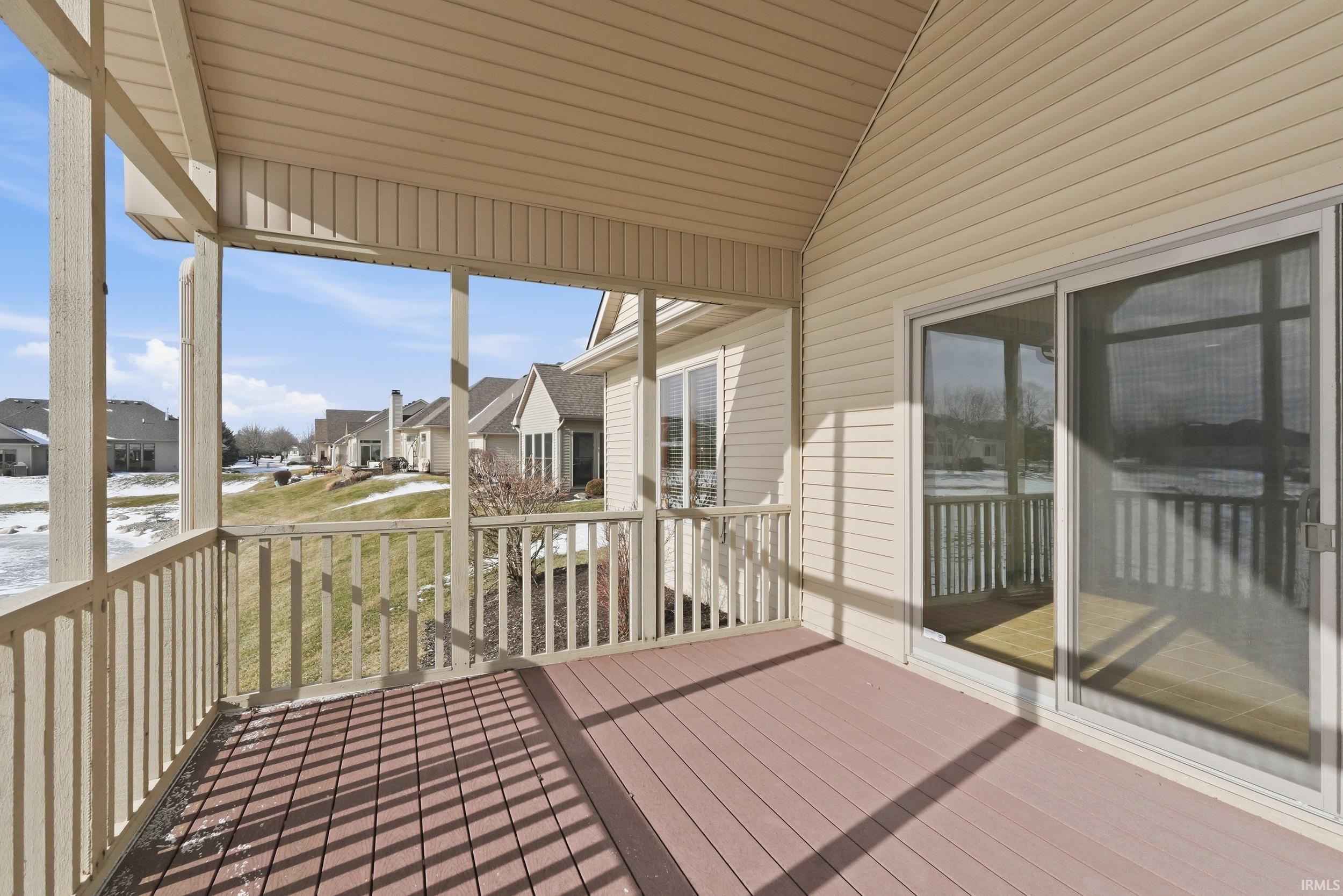 Wooden deck featuring a residential view