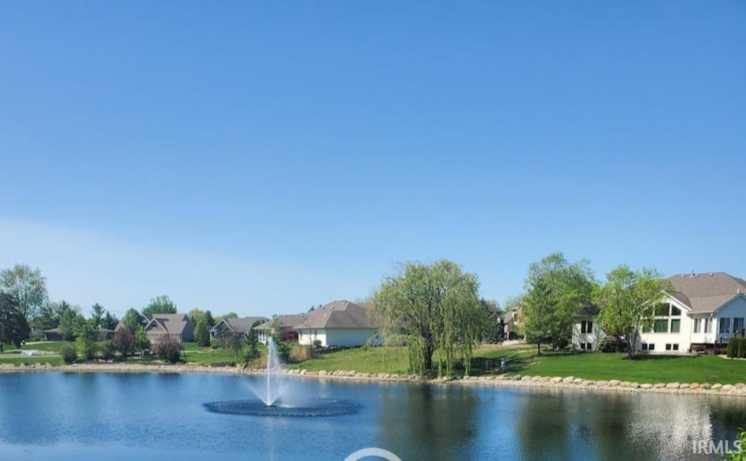 Water view featuring nearby suburban area